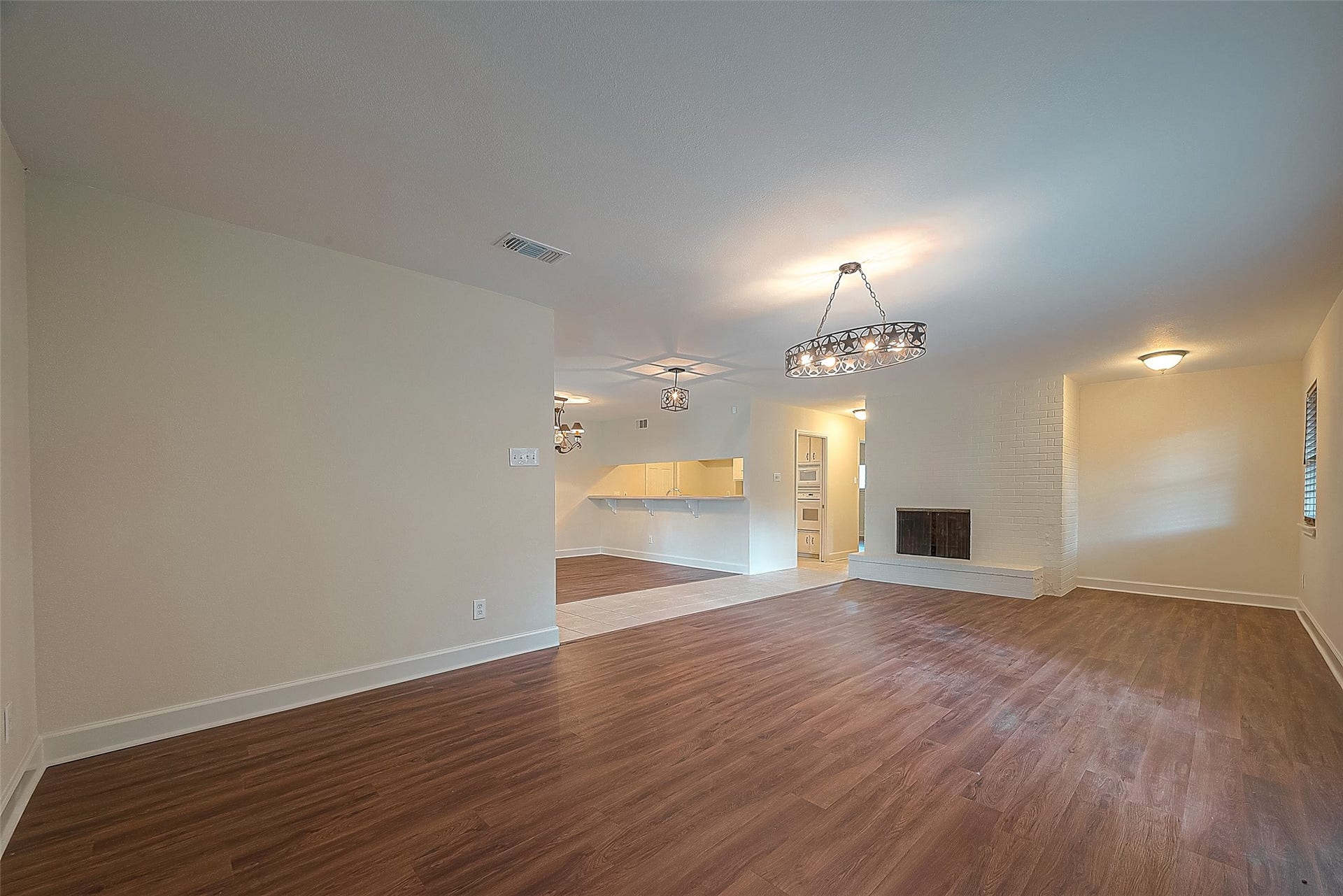 20 Champions Colony E, Houston, TX 77069 Adding to its charm, the living room includes a cozy fireplace, creating a warm and inviting atmosphere for relaxing evenings.