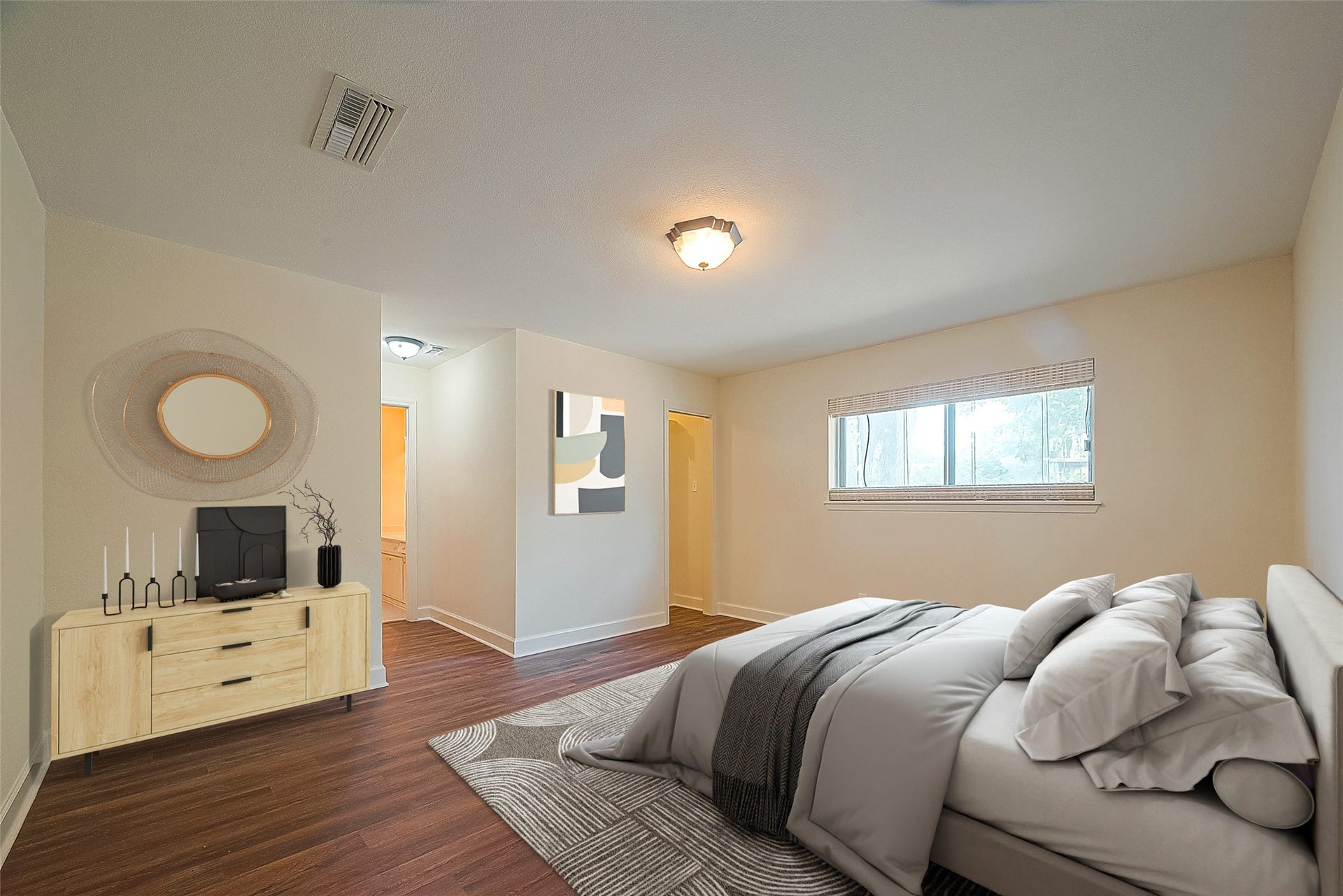 20 Champions Colony E, Houston, TX 77069 Expansive primary bedroom complete with an ensuite bathroom and a generously sized walk-in closet. *virtually staged