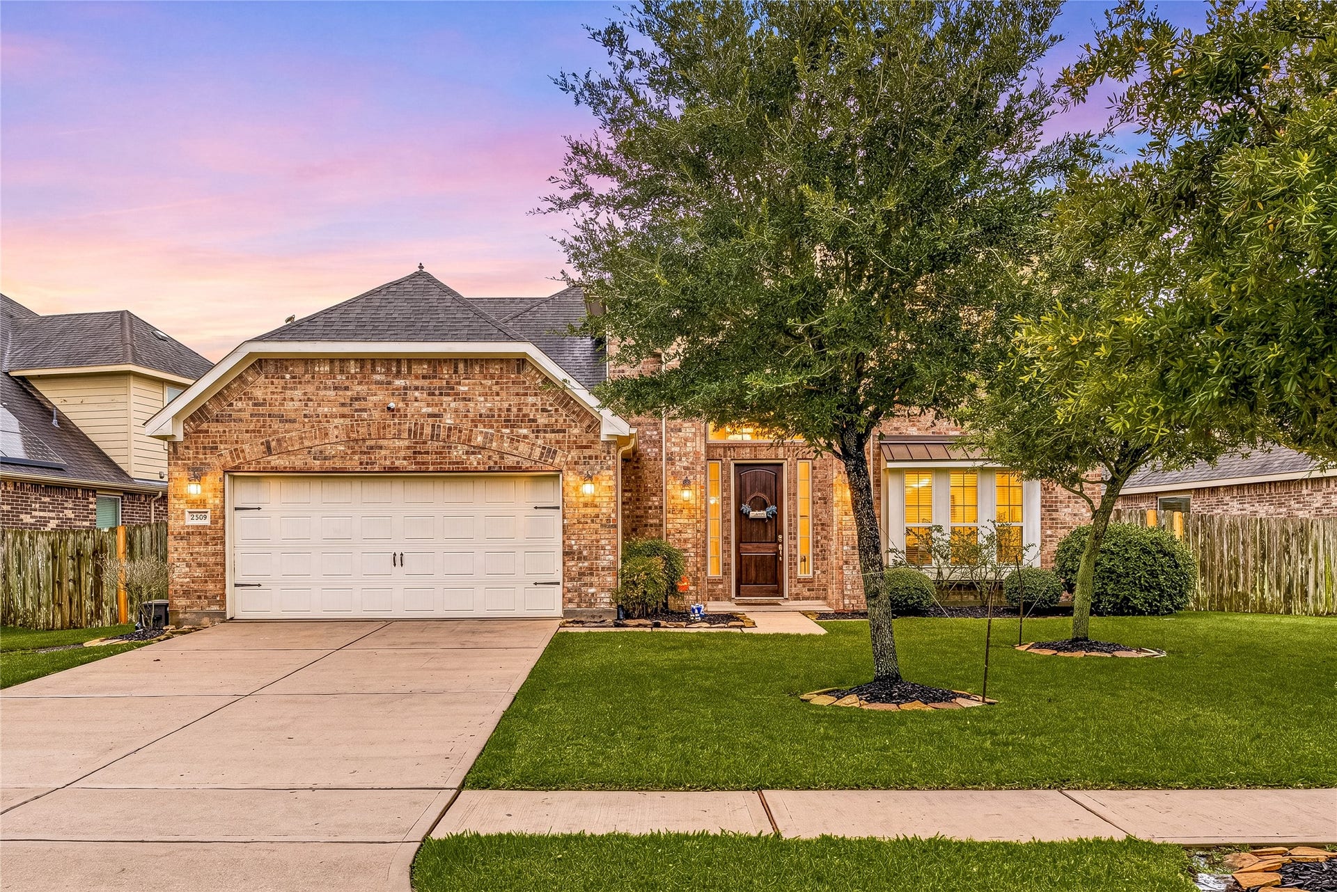 7018 Pearl Terrace Lane, Richmond, TX 77469 Welcome home to 7018 Pearl Terrace Ln located on a quiet street in Walnut Creek and zoned to LCISD! This stunning home has lovely curb appeal, a well-manicured lawn, beautiful landscaping, brick elevation, dark stained front door, covered front porch, traditional style and a double wide driveway!