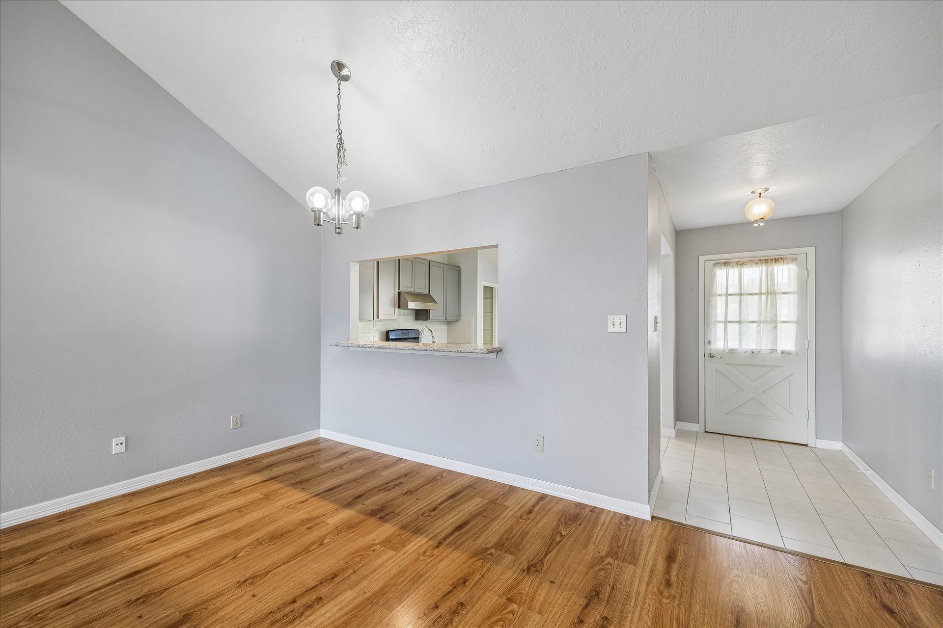 16911 Summer Dawn Place, Houston, TX 77095 Dedicated dining area sits conveniently between the kitchen and living room, with a pass-through that keeps the spaces visually connected.