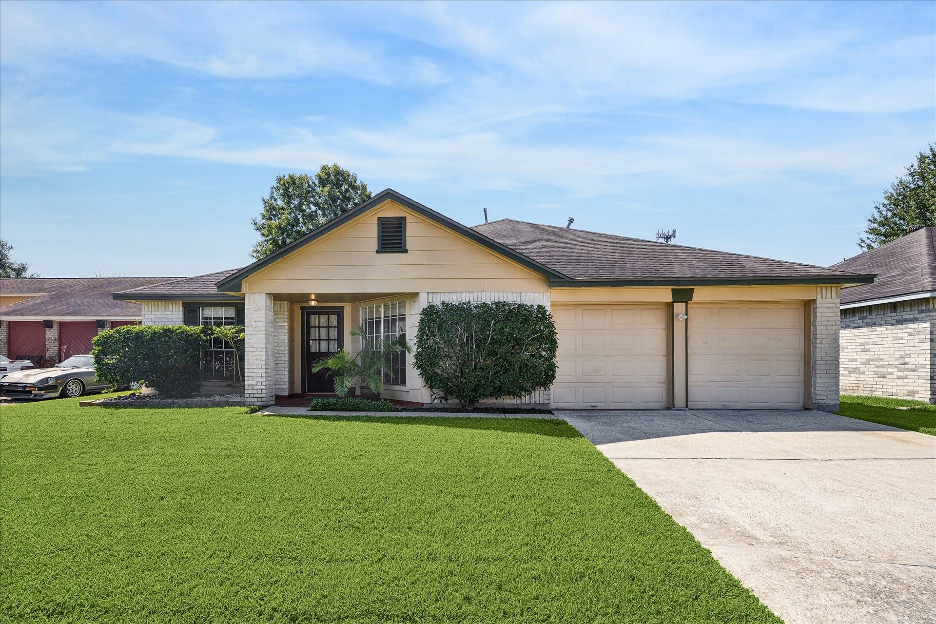 16911 Summer Dawn Place, Houston, TX 77095 Well-maintained single-story home, set on a spacious 6,300 SF lot with a broad front lawn, mature landscaping, and an attached two-car garage. A 2020 roof adds another notable update to the home.