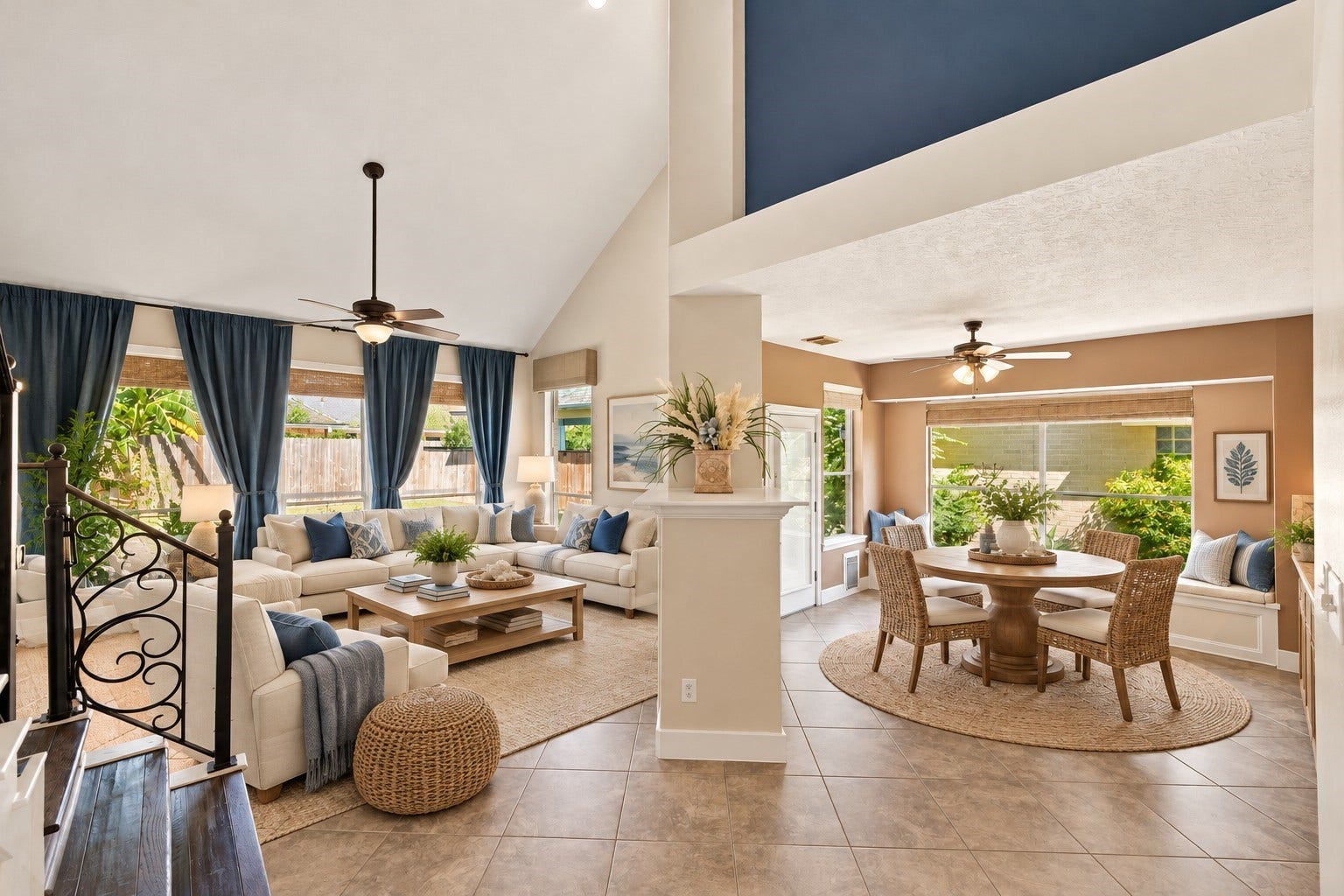 201 Lago Vista Street, League City, TX 77565 The foyer leads to an inviting living room and breakfast area, seamlessly connected by a dual-sided fireplace.