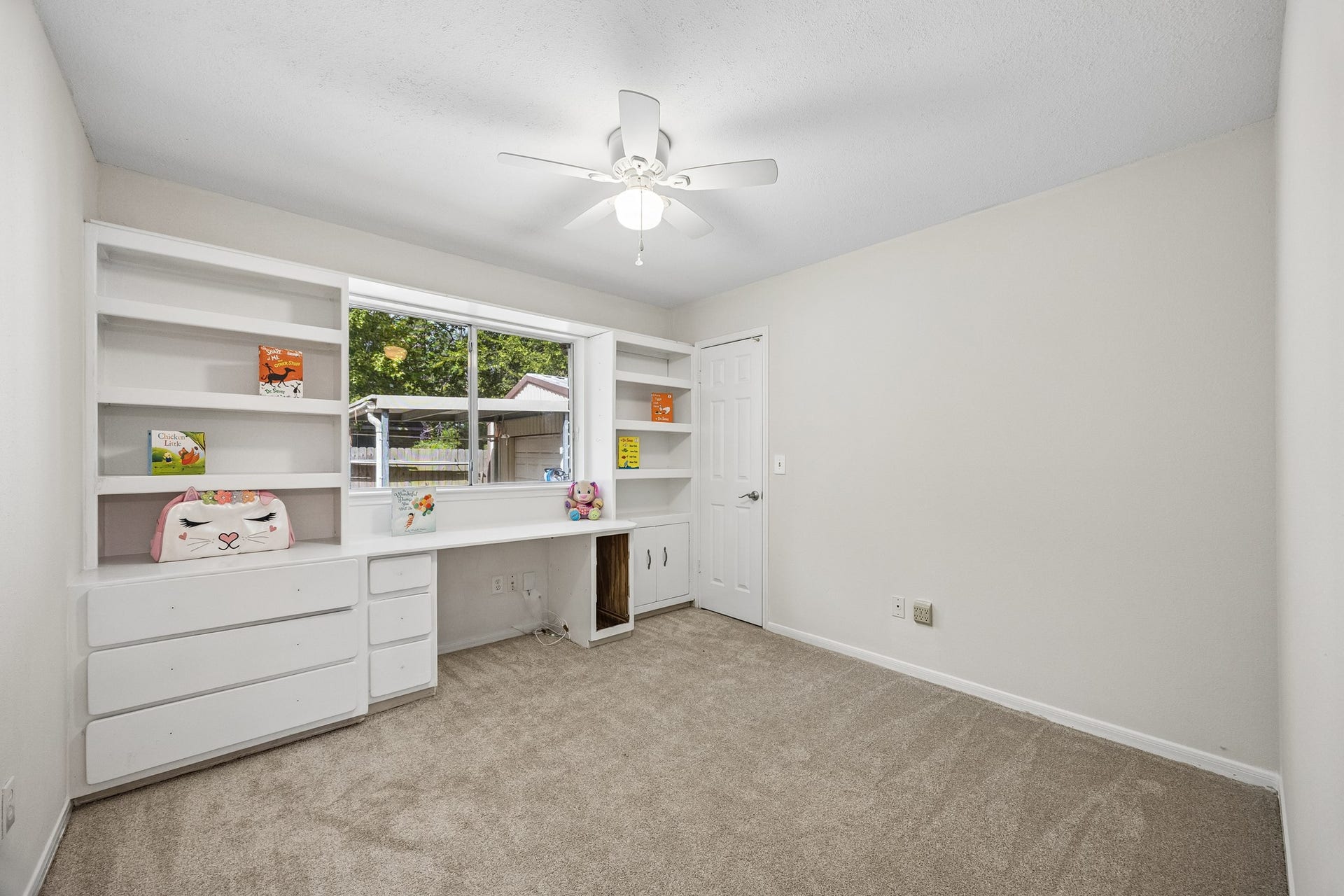 2716 Village Mills Drive, Pearland, TX 77584 Bedroom #3 with build-in shelves and desk.