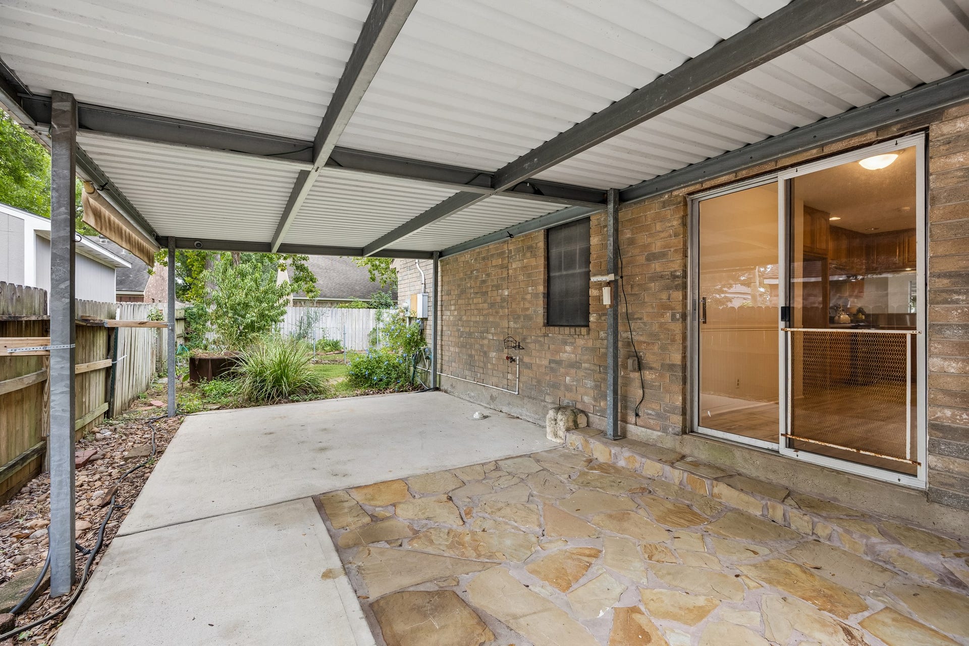 2716 Village Mills Drive, Pearland, TX 77584 Covered patio area.
