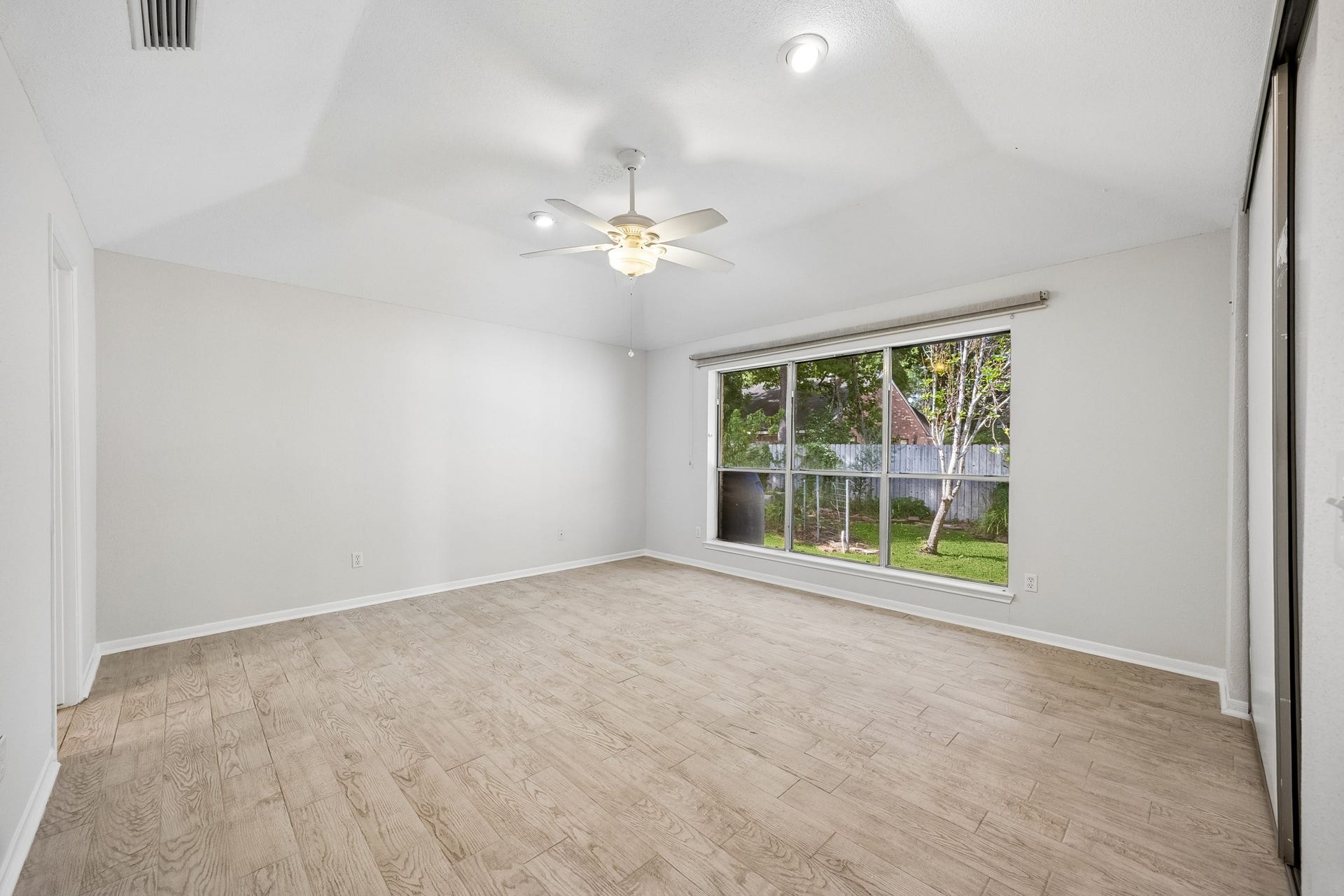 2716 Village Mills Drive, Pearland, TX 77584 Primary bedroom overlooks backyard.