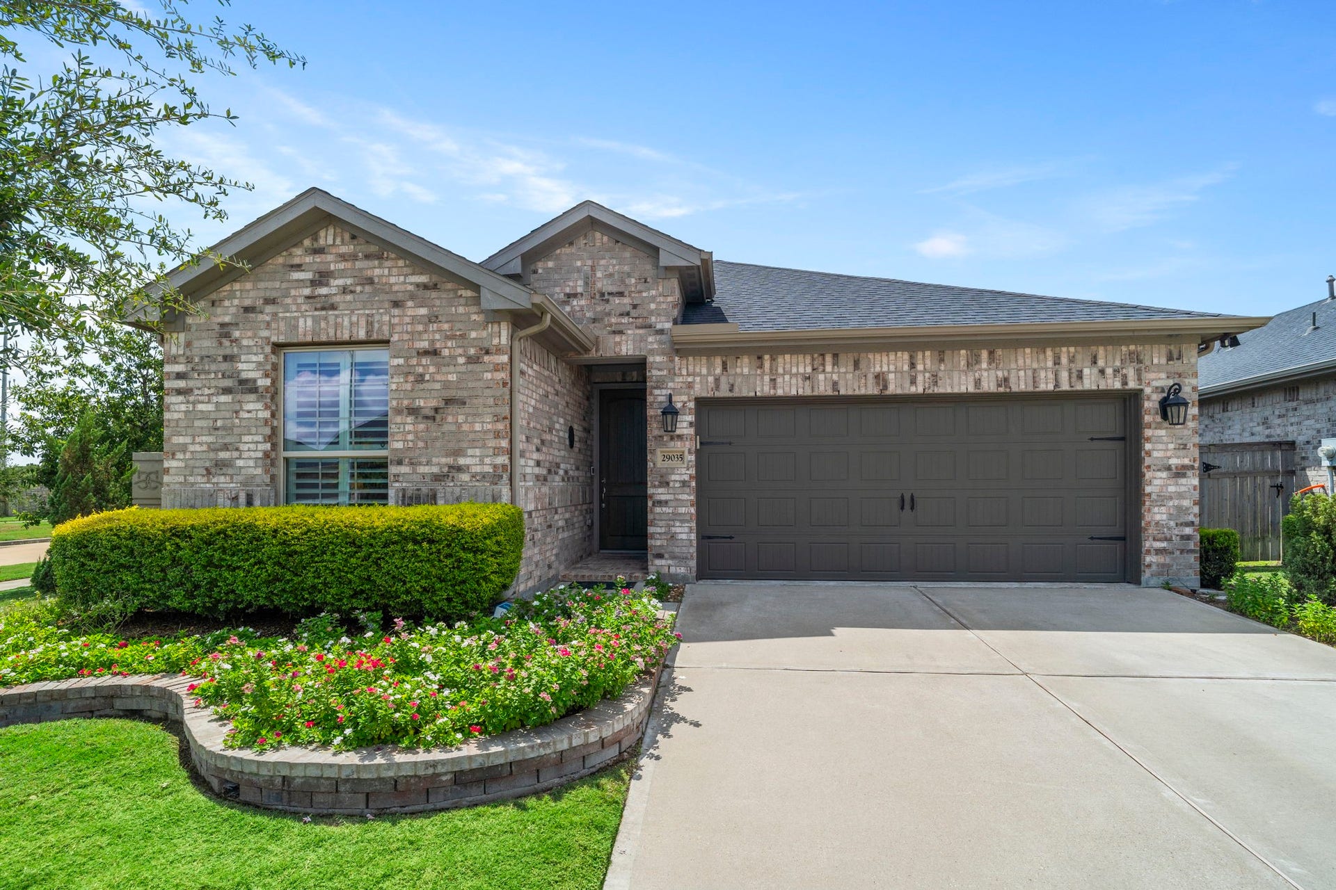 29035 Hickory Manor Lane, Fulshear, TX 77441 Welcome home to this picture-perfect, brick one-story inBonterra at Cross Creek Ranch, a premier 55+ gated community offering an exceptional lifestyle with fabulous amenities.