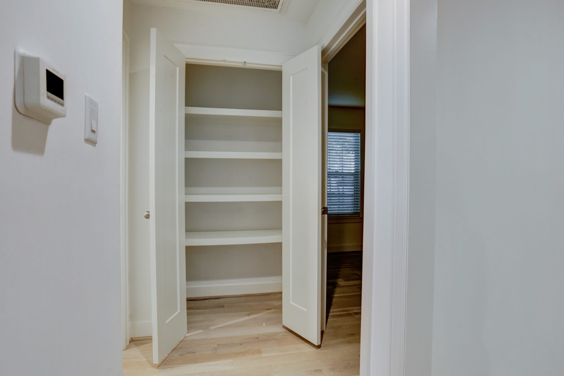 4419 Cynthia, Bellaire, TX 77401 Linen closet at the end of the hallway.