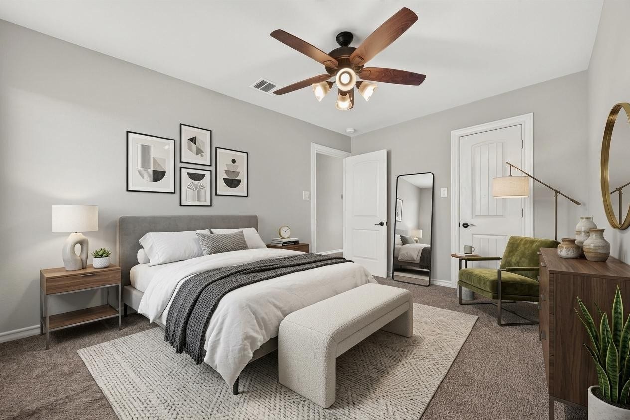 3658 Diamond Creek Drive, Missouri City, TX 77459 Virtually staged. Additional bedroom offers a comfortable layout with natural light and ceiling fan. Ample wall space allows for flexible furniture placement.
