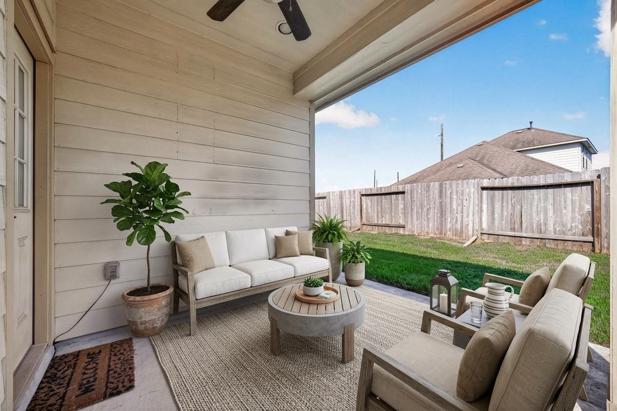 3658 Diamond Creek Drive, Missouri City, TX 77459 Virtually staged. Covered rear outdoor area overlooking the fenced backyard. An inviting setting for relaxing or enjoying the outdoors.