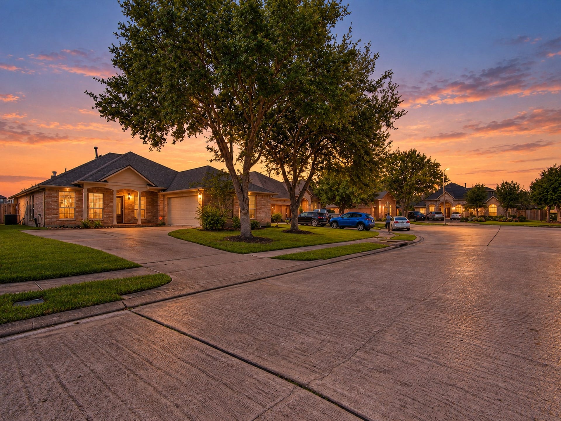 12906 Brook Arbor Court, Pearland, TX 77584 A street-side view captures the home's setting and mature trees along the Brook Arbor Ct cul-de-sac