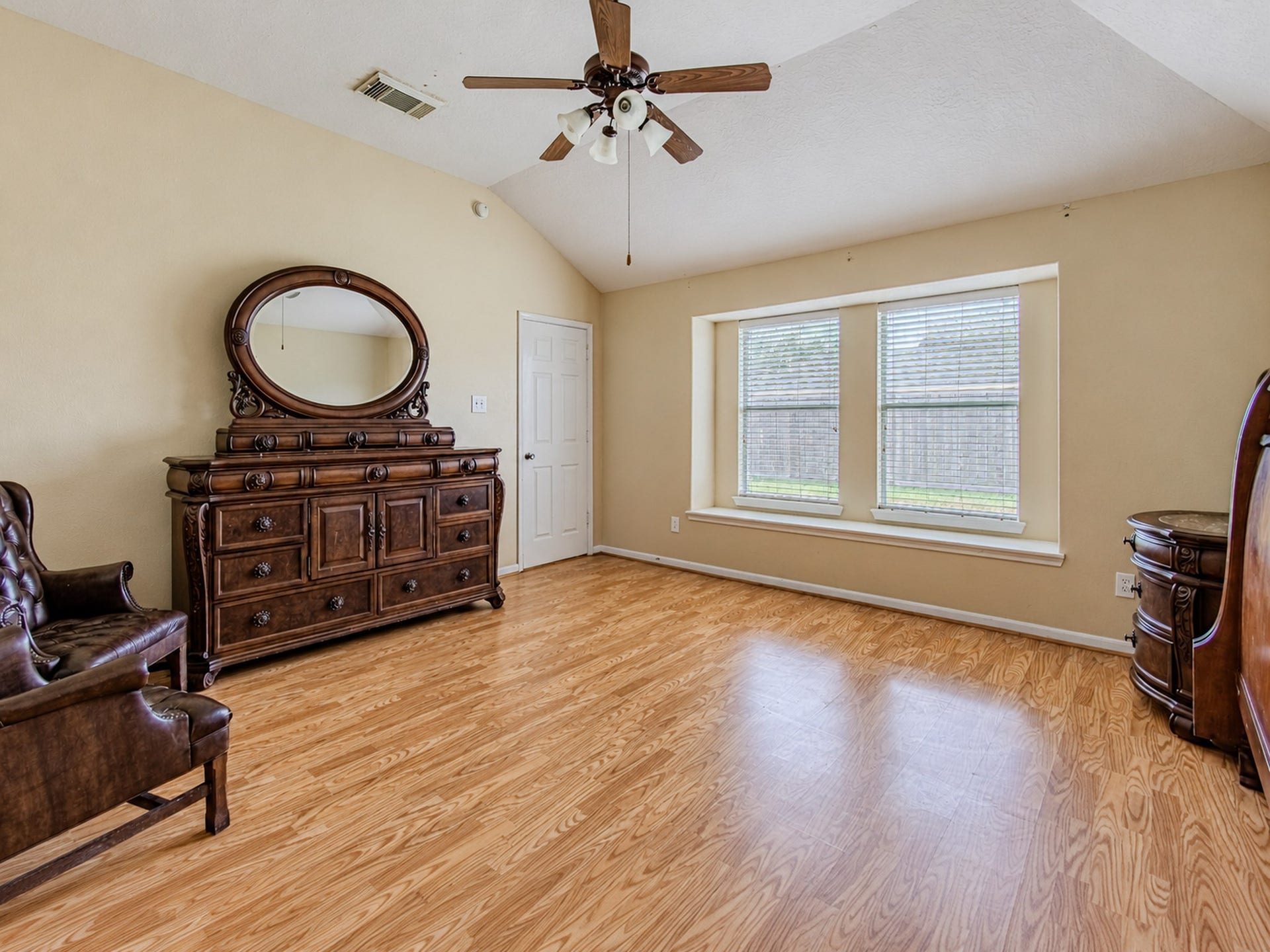 12906 Brook Arbor Court, Pearland, TX 77584 Another view of the primary bedroom showcasing its large window and generous floor space