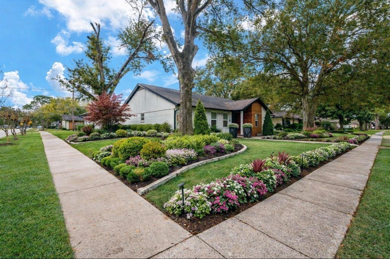 10603 Riverview Drive, Houston, TX 77042 To enhance the curb appeal and showcase the property's potential, the photo landscaping has been virtually staged.