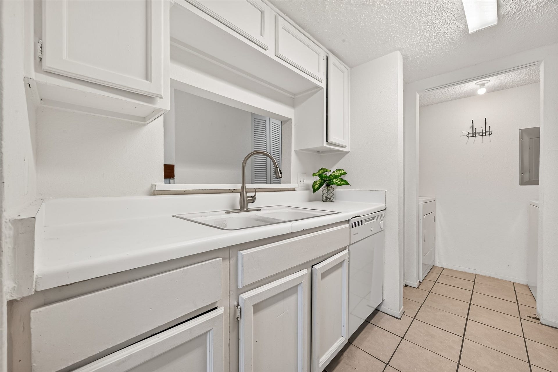 9523 Pagewood Lane, #9523, Houston, TX 77063 this pic show the Convenient laundry room equipped with washer and dryer.
