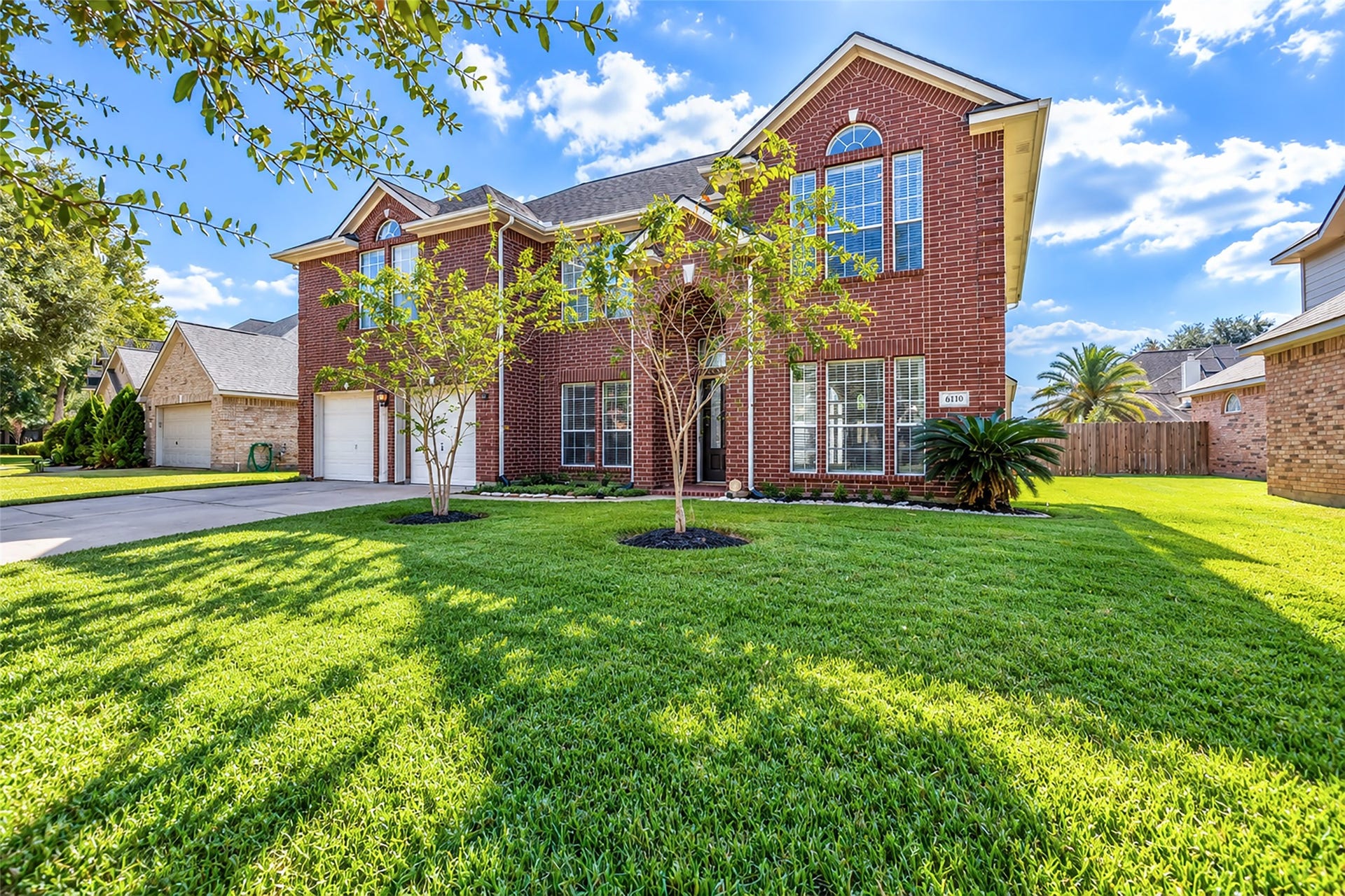 6110 Four River Drive, Richmond, TX 77469 Welcome home! Your two-story brick home with large windows, manicured lawn, and a spacious driveway, offering great curb appeal in a serene neighborhood setting!