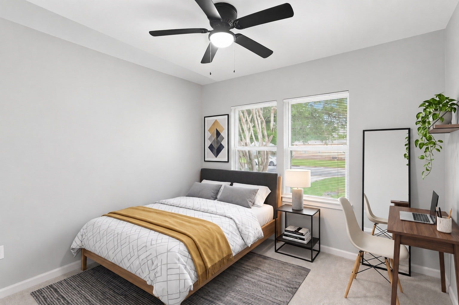 Your second bedroom offers a generous and inviting space that exudes comfort and versatility. Virtually staged.