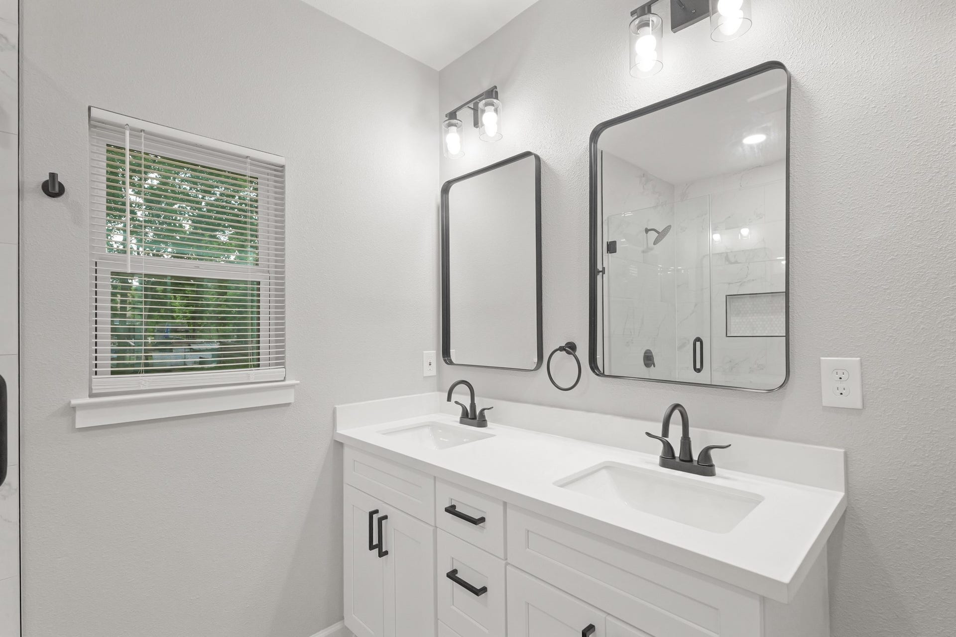 Dual vanities in your primary bath, offer personal space with dedicated cabinet space.