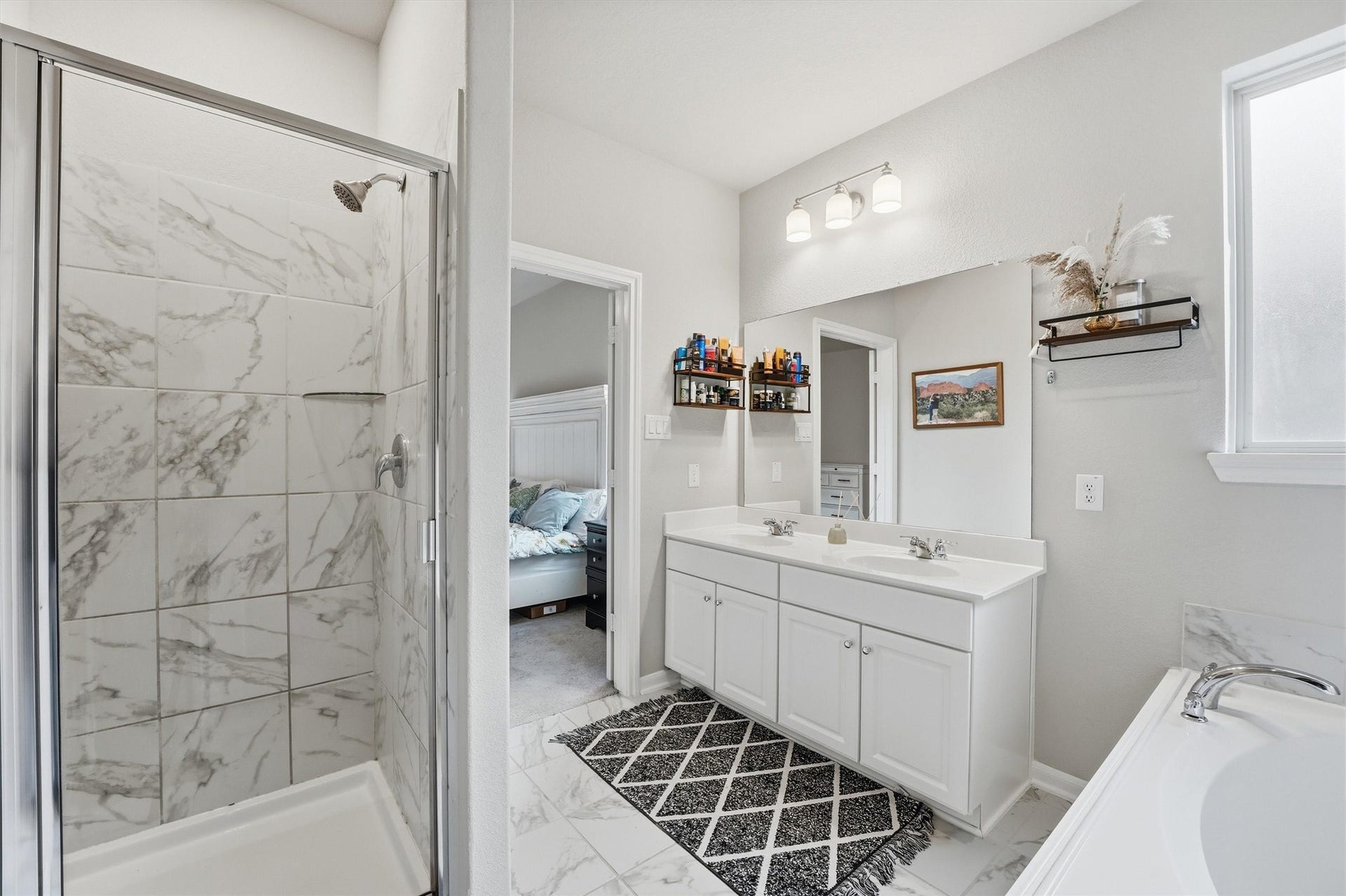 2130 Shellbark Way, La Marque, TX 77568 Primary bath also includes a separate shower.