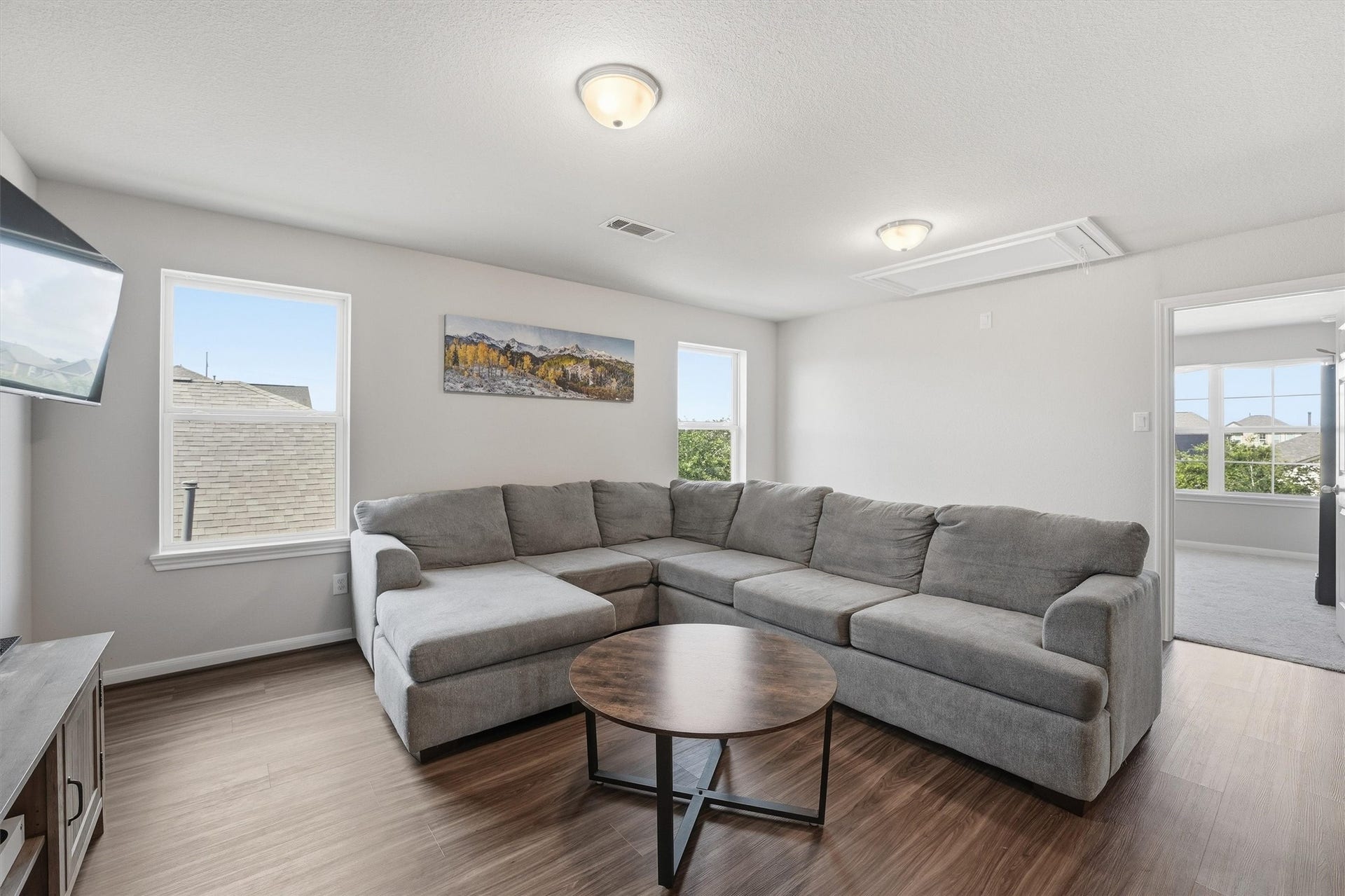 2130 Shellbark Way, La Marque, TX 77568 Bright and spacious game room with a natural light creating a cozy and inviting atmosphere.