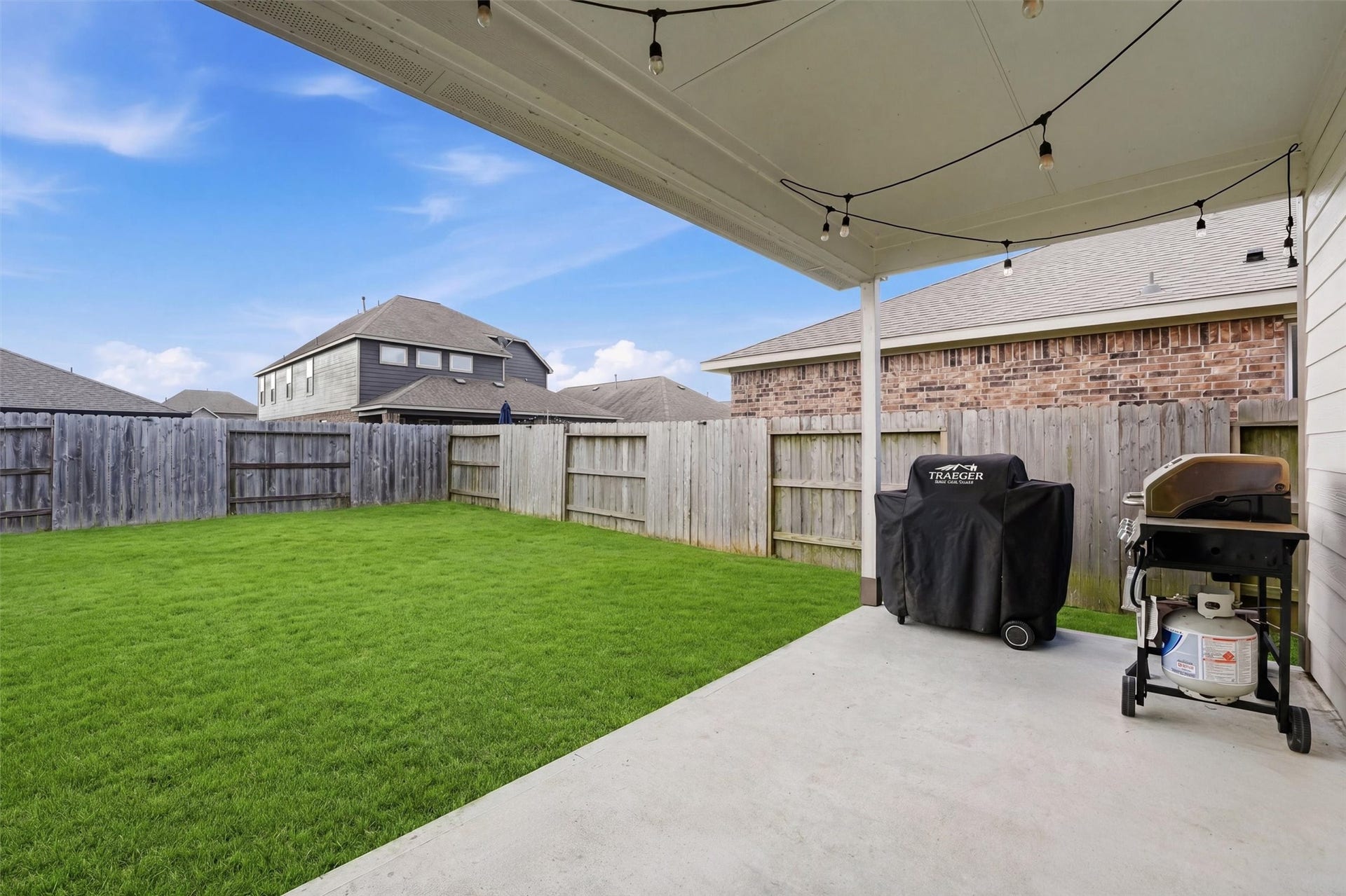 2130 Shellbark Way, La Marque, TX 77568 Covered patio with the potential to provide a private outdoor space ideal for entertaining or relaxing.