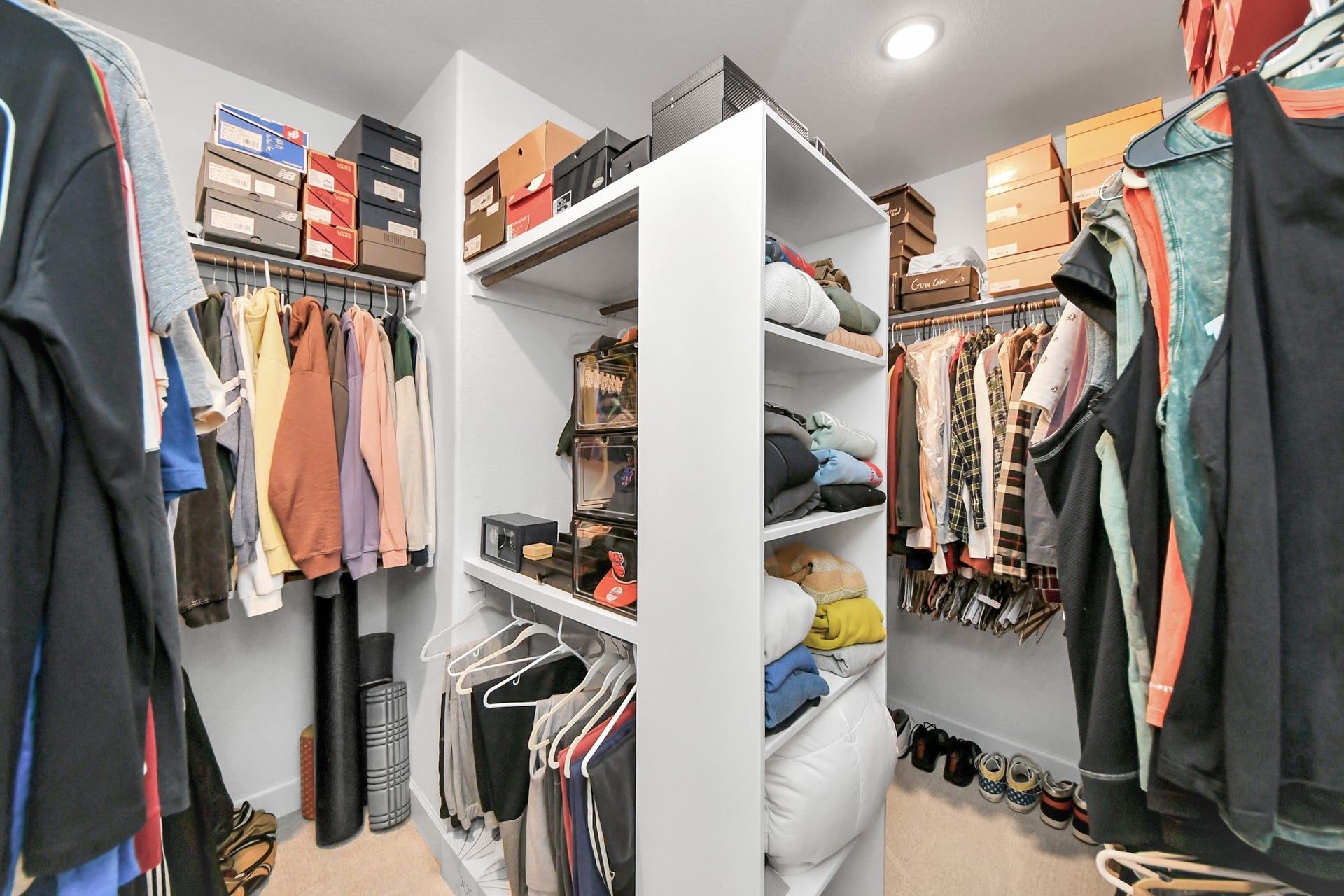 5542 Fairfield Lane, Pasadena, TX 77505 Spacious walk-in closet with ample shelving and hanging space, perfect for organizing clothes and shoes.