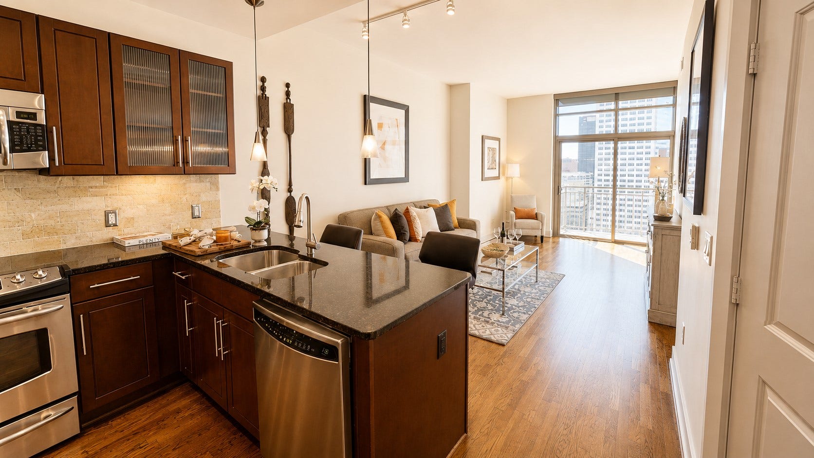 1400 McKinney Street, #2306, Houston, TX 77010 From here, you can really appreciate how well the spaces flow together. The kitchen opens naturally into the living room, with the skyline drawing your eye toward the windows beyond.