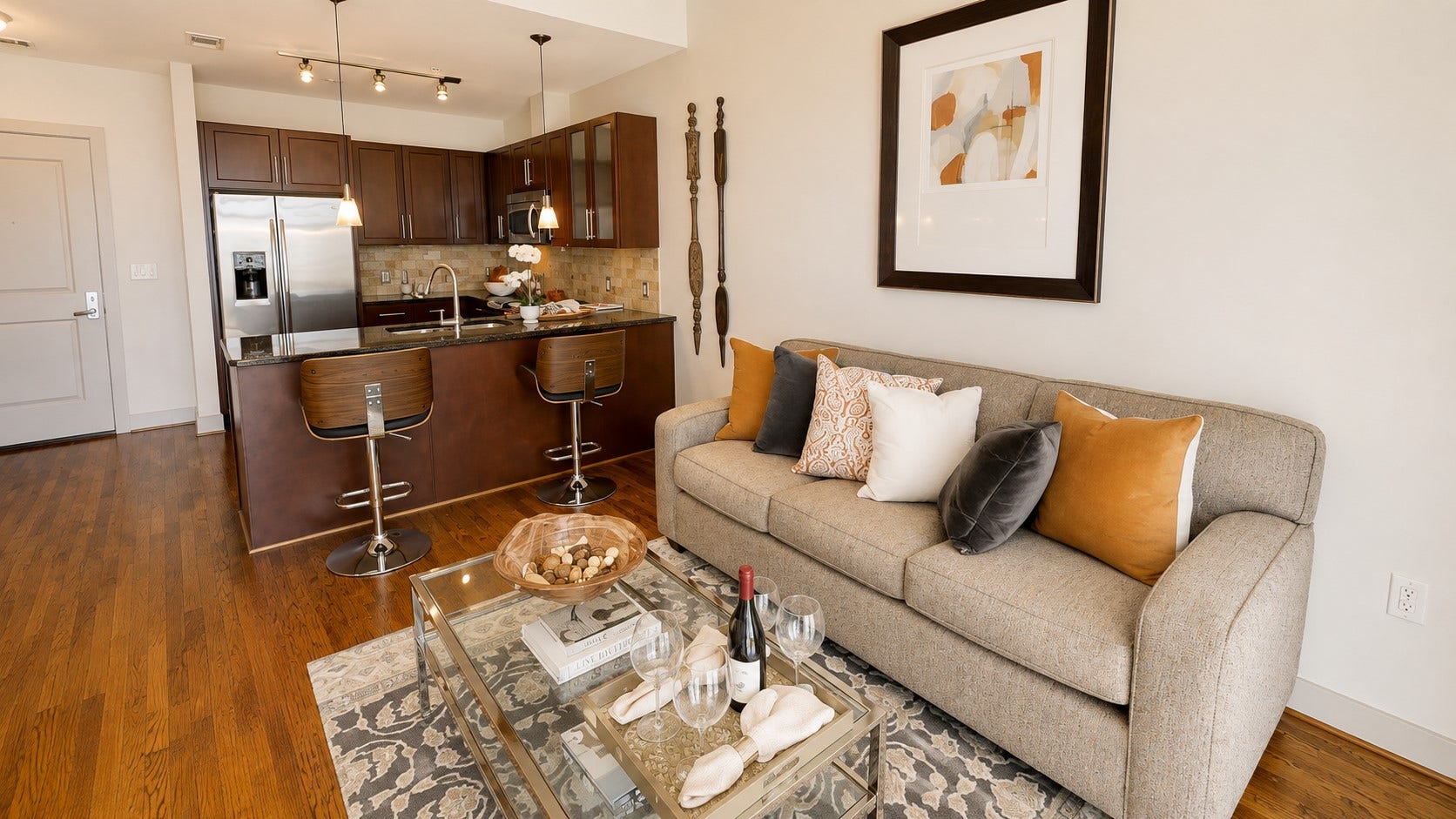 1400 McKinney Street, #2306, Houston, TX 77010 Comfortable enough for a quiet evening at home and open enough for friends to gather, this living room easily adapts to both.