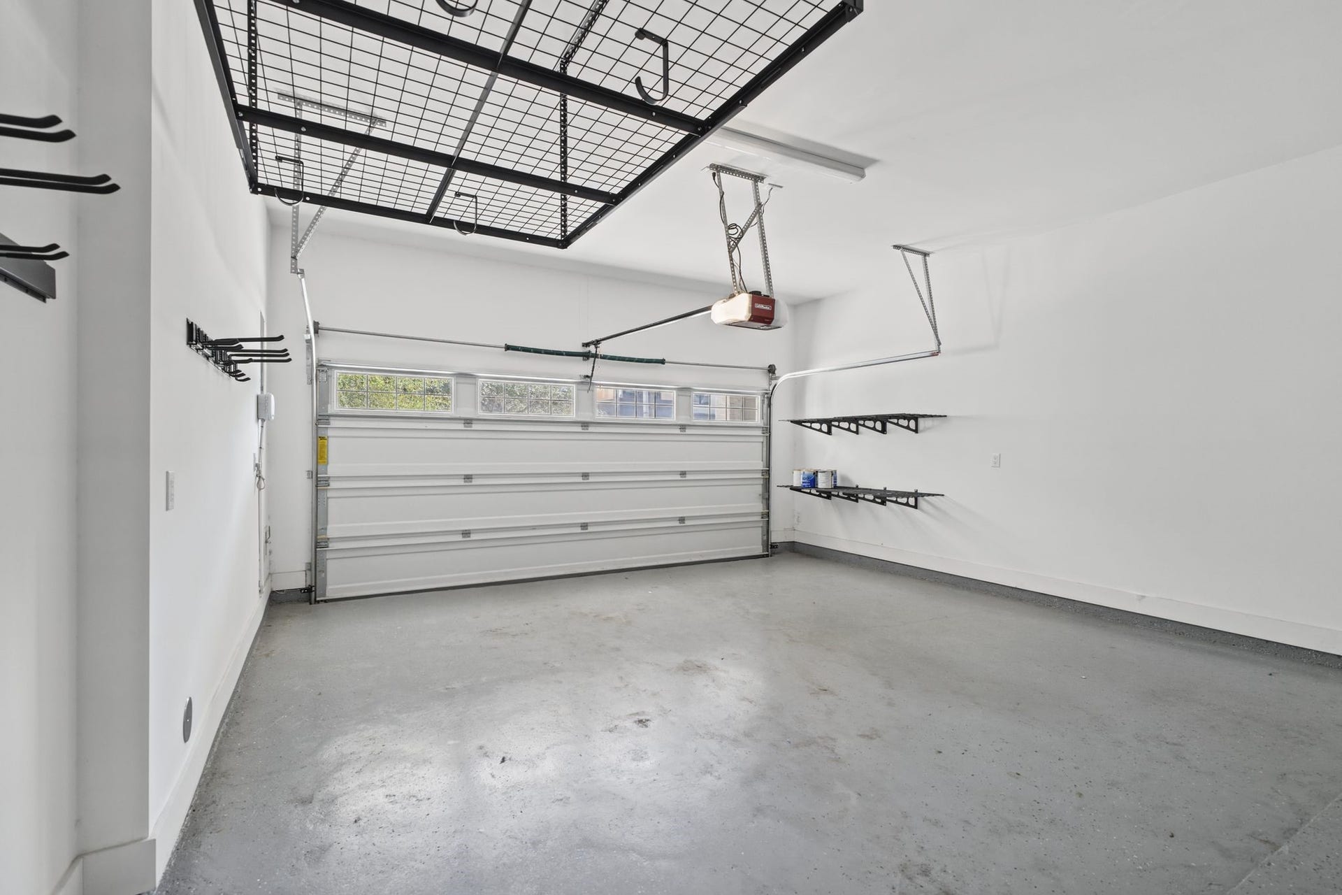 1538 Vermont Street, #A, Houston, TX 77006 Another view of the garage space with additional storage racks.