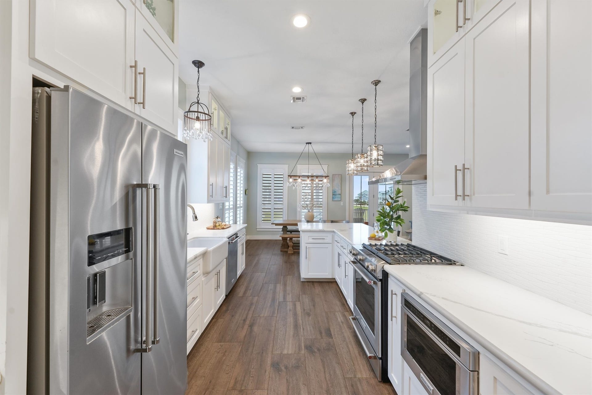 11418 Starfish Lane, Galveston, TX 77554 The kitchen also features aa pantry with a second fridge