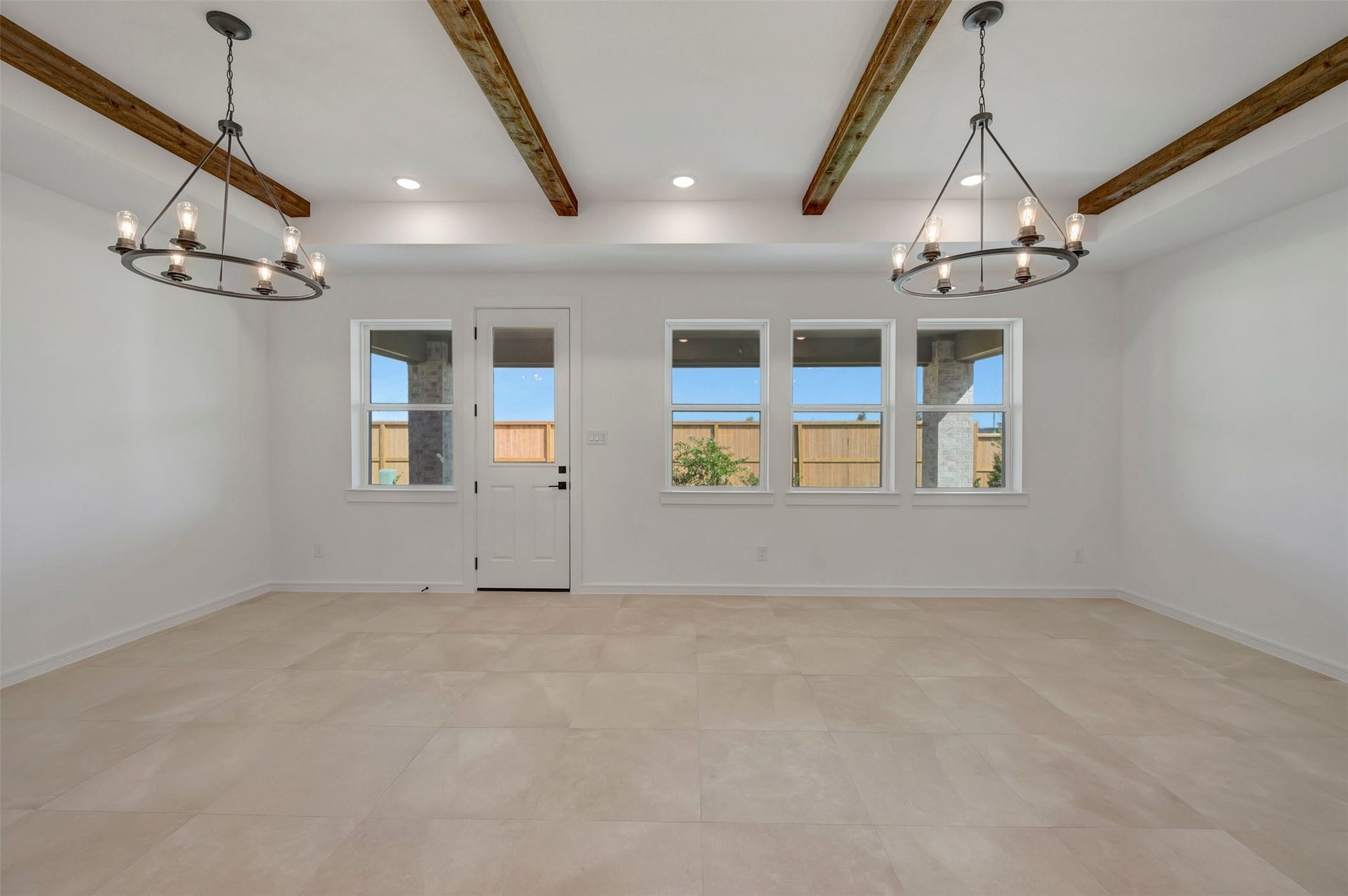 4225 White Springs Lane, League City, TX 77573 Bright and airy living area with stained ceiling beams (*Photo not of actual home and used for illustration purposes only.)