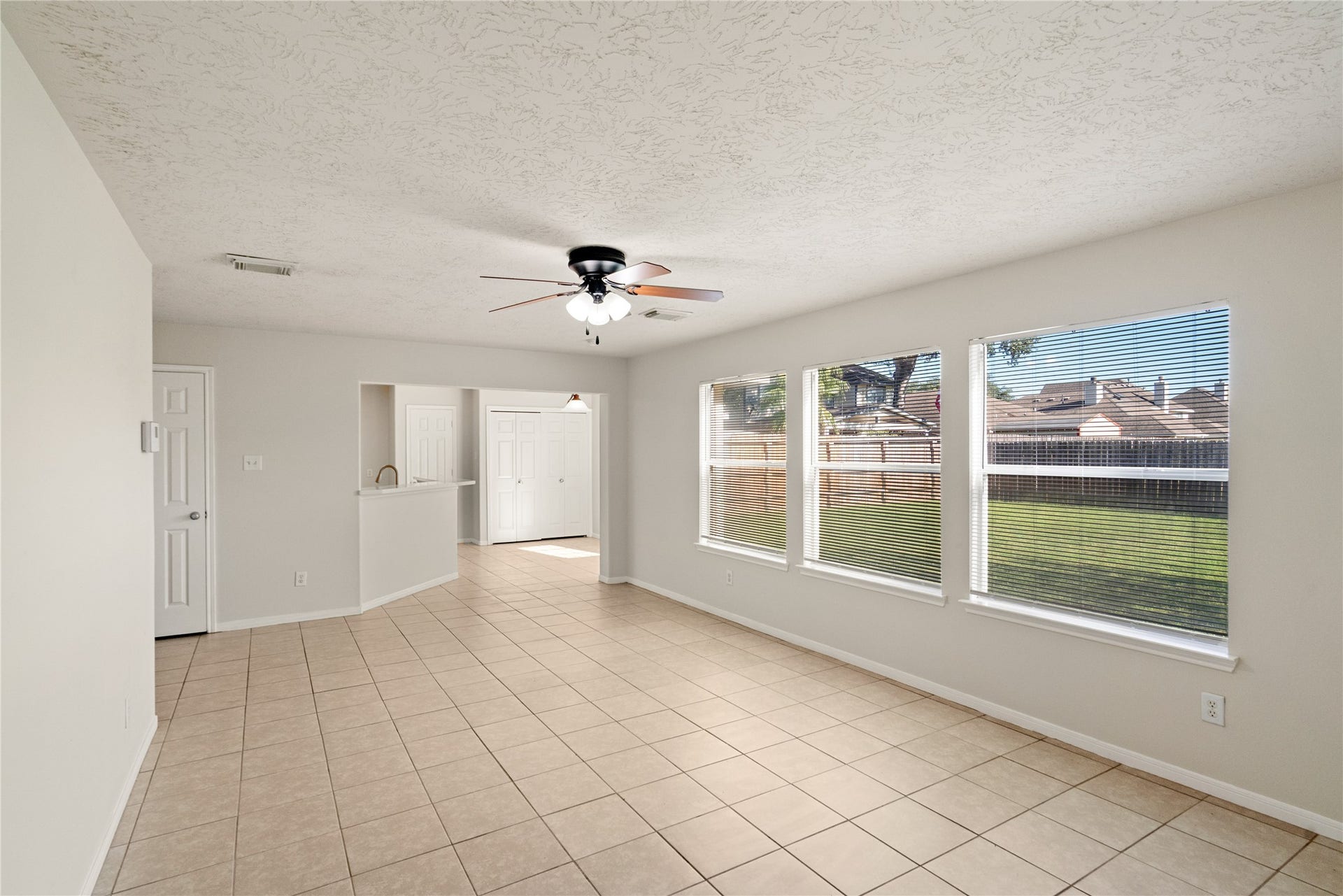 Living Room View to Kitchen Lots of Natural Light