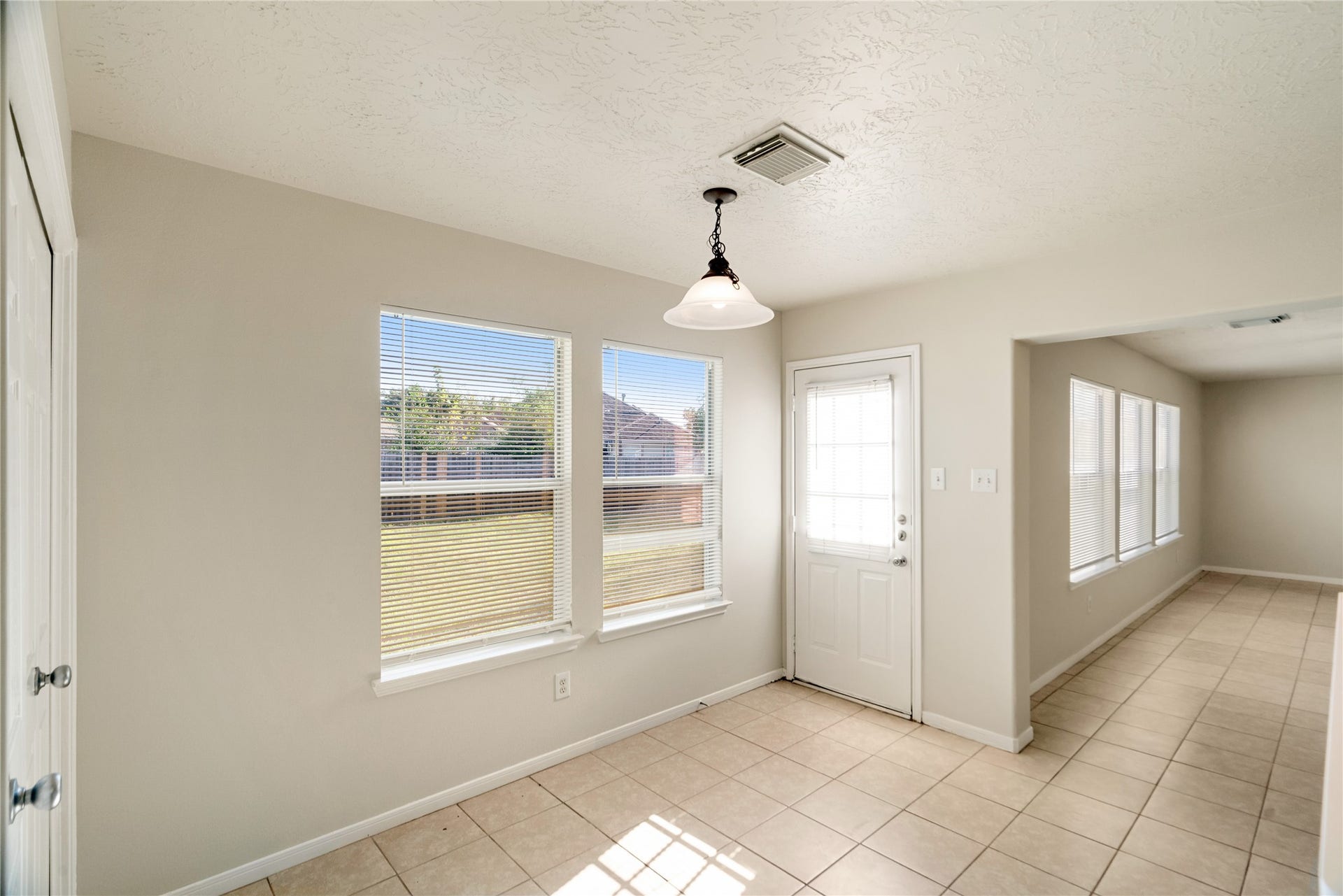 Natural Light, Breakfast Nook, and Back Door