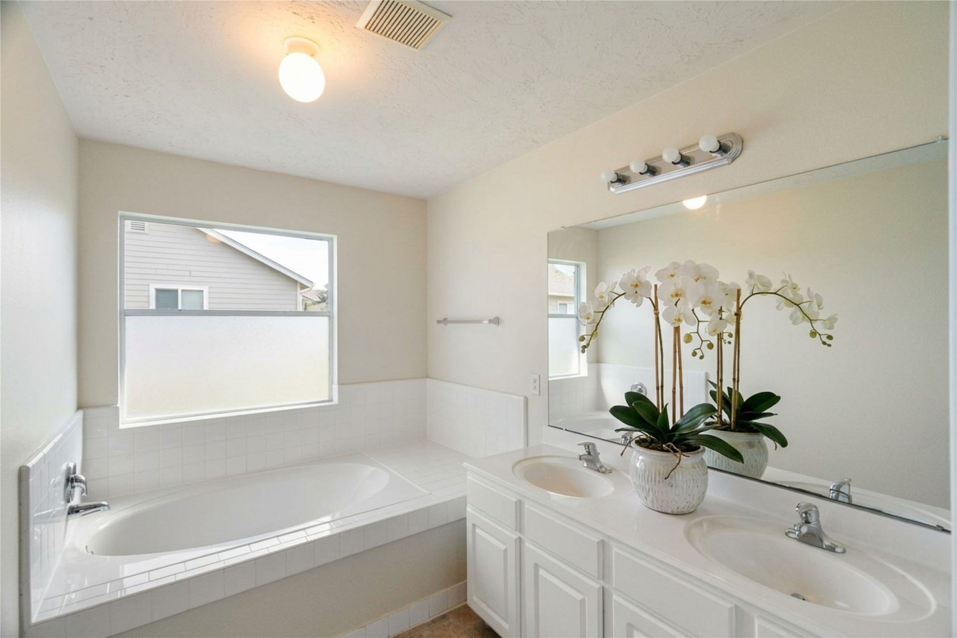 Primary Bathroom Soaking Tub,and Dual Sink Vanity