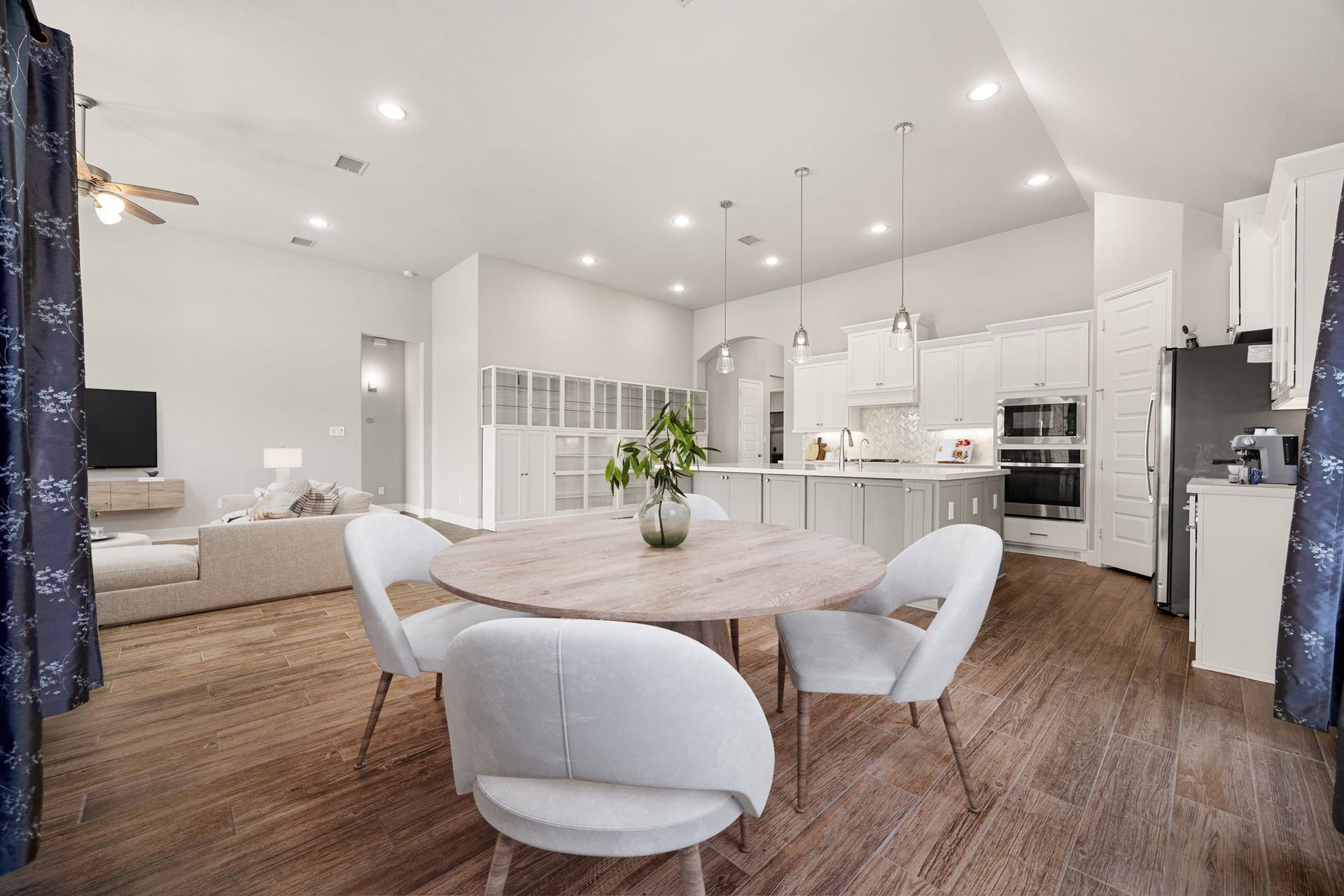 Additional view from dining - looking out towards kitchen and family room. *Virtually Staged