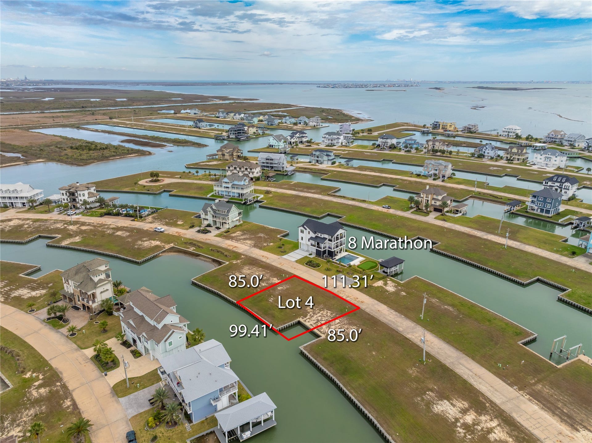 8 Marathon, Hitchcock, TX 77563 Great location & list value with open water views from every angle. Minutes boat ride to the marina channel, ships store & the Intracoastal Waterway. Front of homesite overlooks neighbors putting green & pool creating open East facing views