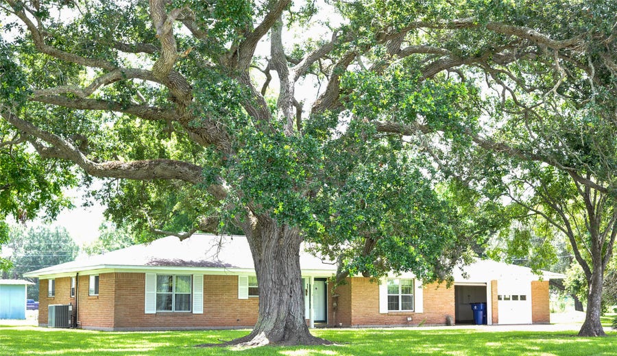 Property photo for 402 Peach Point Road, Jones Creek, TX