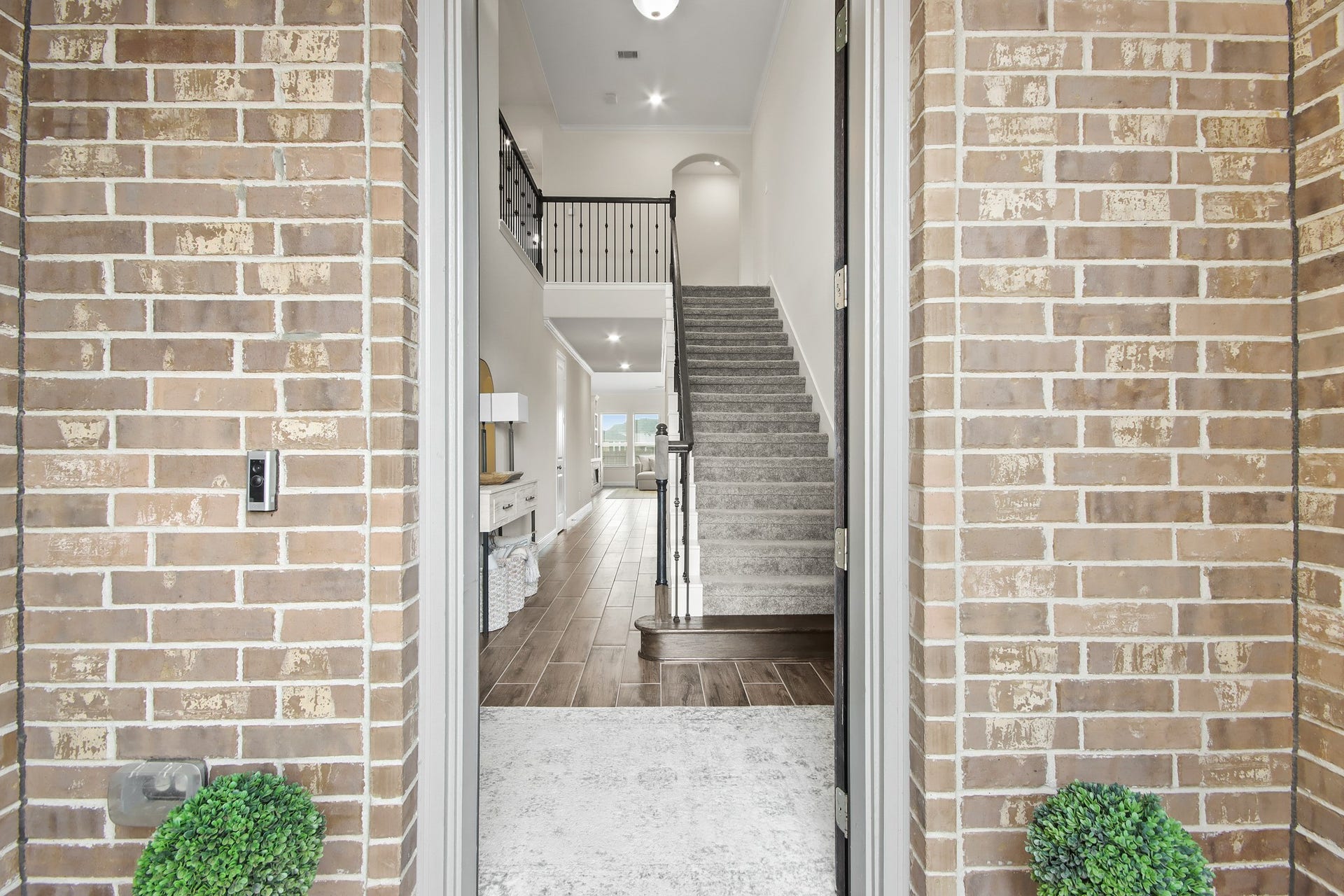 Inviting Woodcraft 8' Mahogany wrought iron front door with Charcoal stain