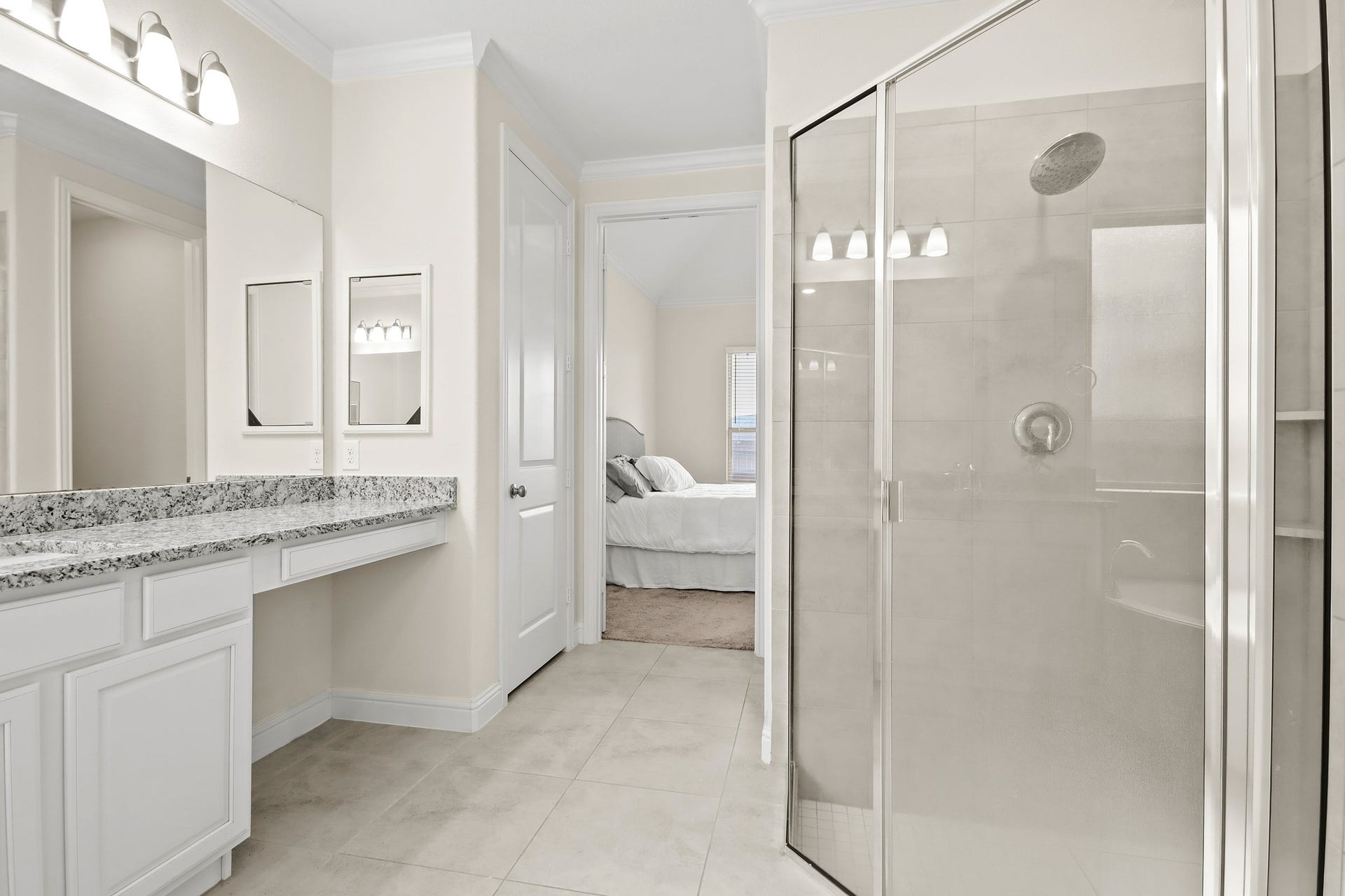 Upgraded large tile flooring throughout primary bathroom