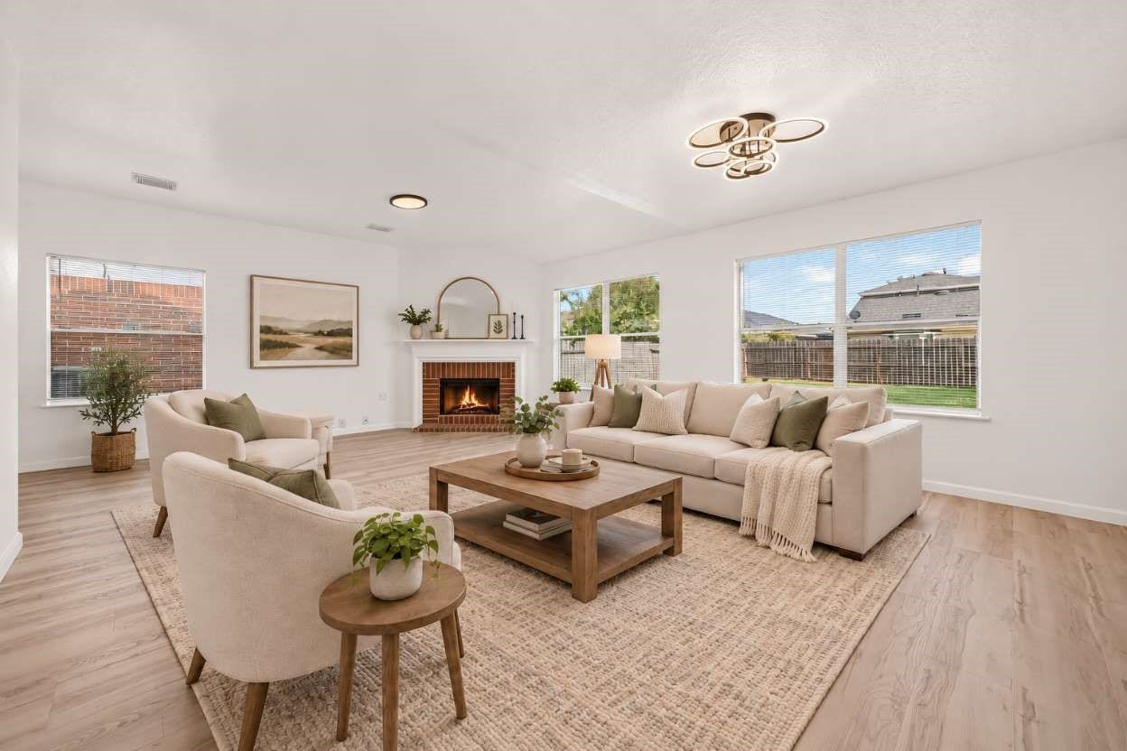 open living area with plenty of natural light. This image has been virtually staged for visual purposes.