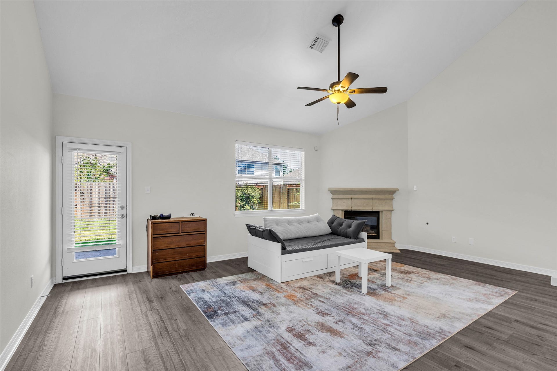 living room with gas log fireplace