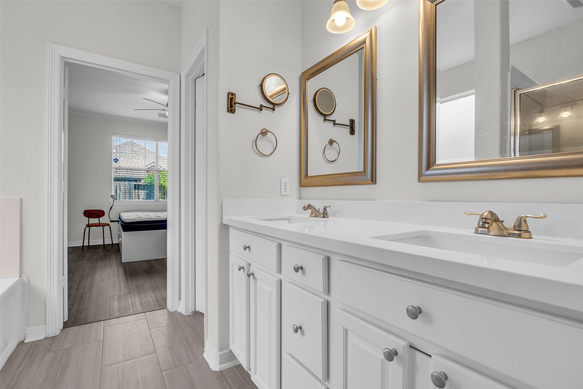 Primary bath with dual sinks, seperate shower, and 8'x9' closet