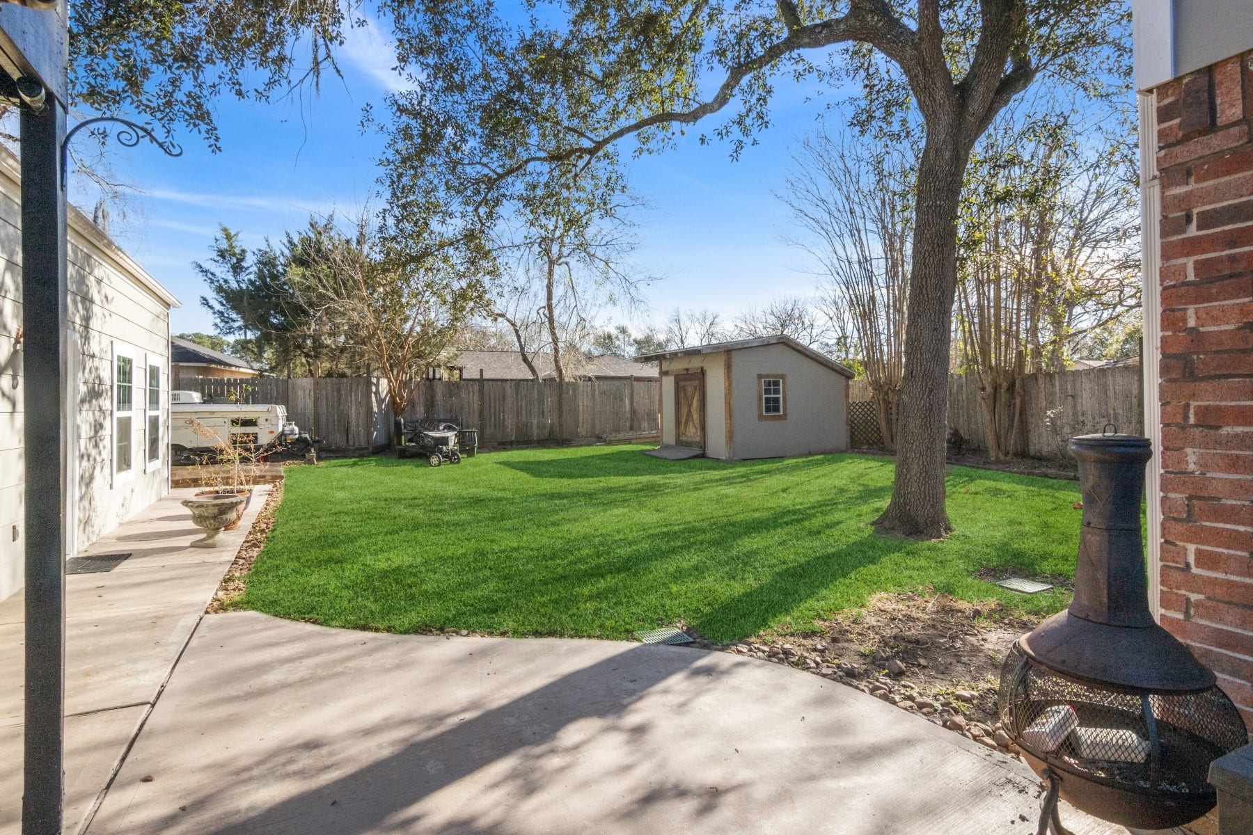 5443 Appleblossom Lane, Friendswood, TX 77546 Storage shed in backyard.