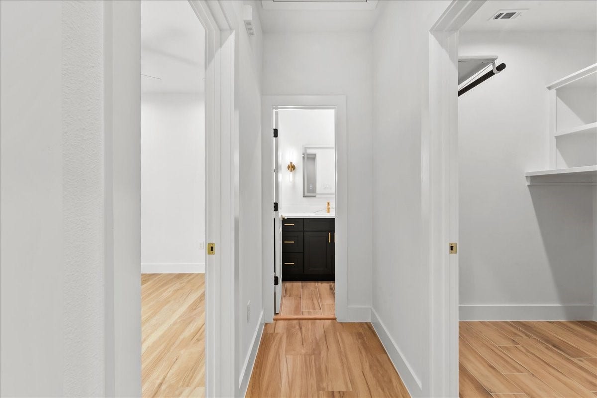 8323 Observatory Street, #A/B, Houston, TX 77088 Unit A - The thoughtfully designed second-level split floor plan offers added privacy and functionality, with the primary suite separated from the secondary bedrooms.