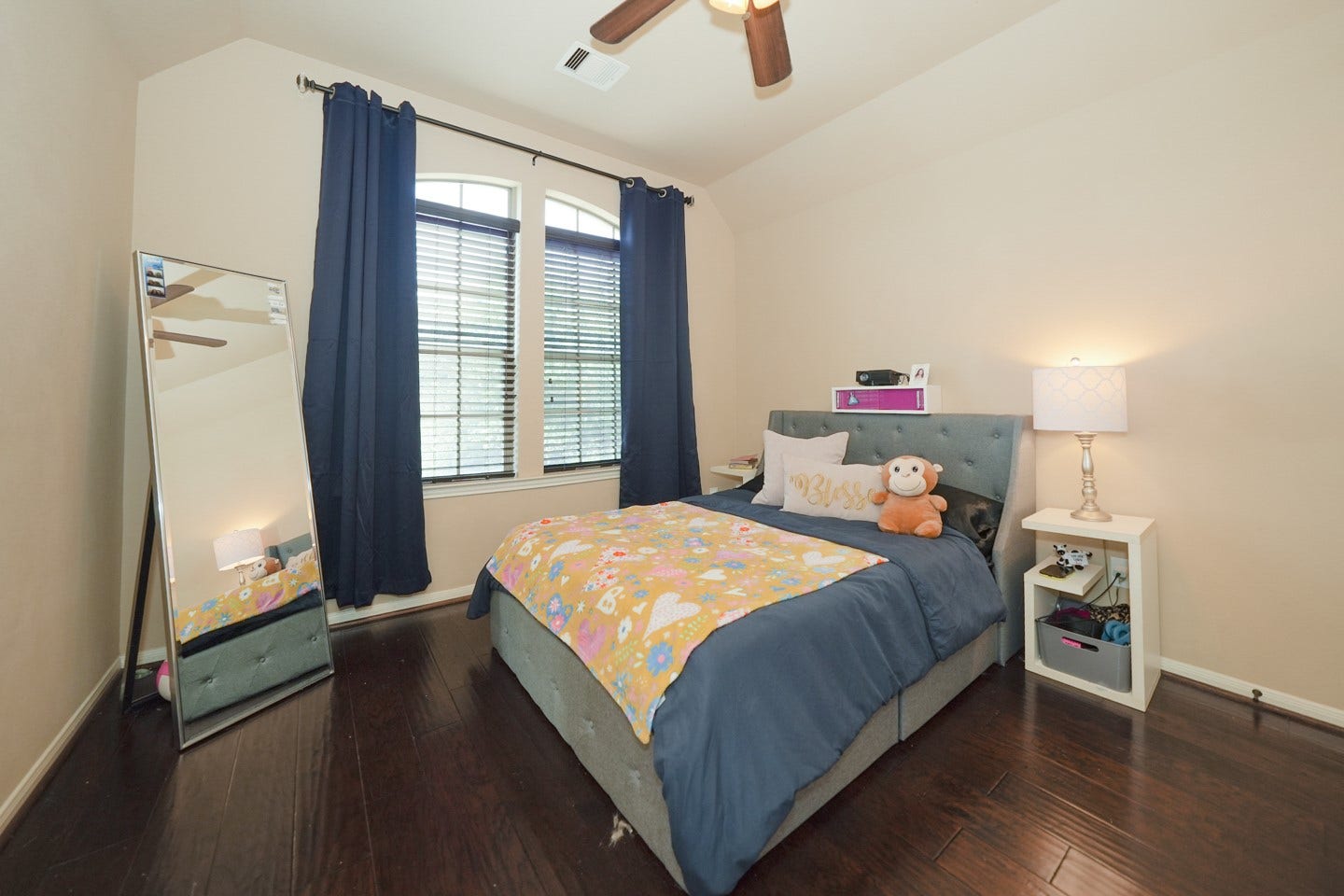 6323 Orange Blossom Lane, Rosenberg, TX 77471 cozy bedroom with large windows