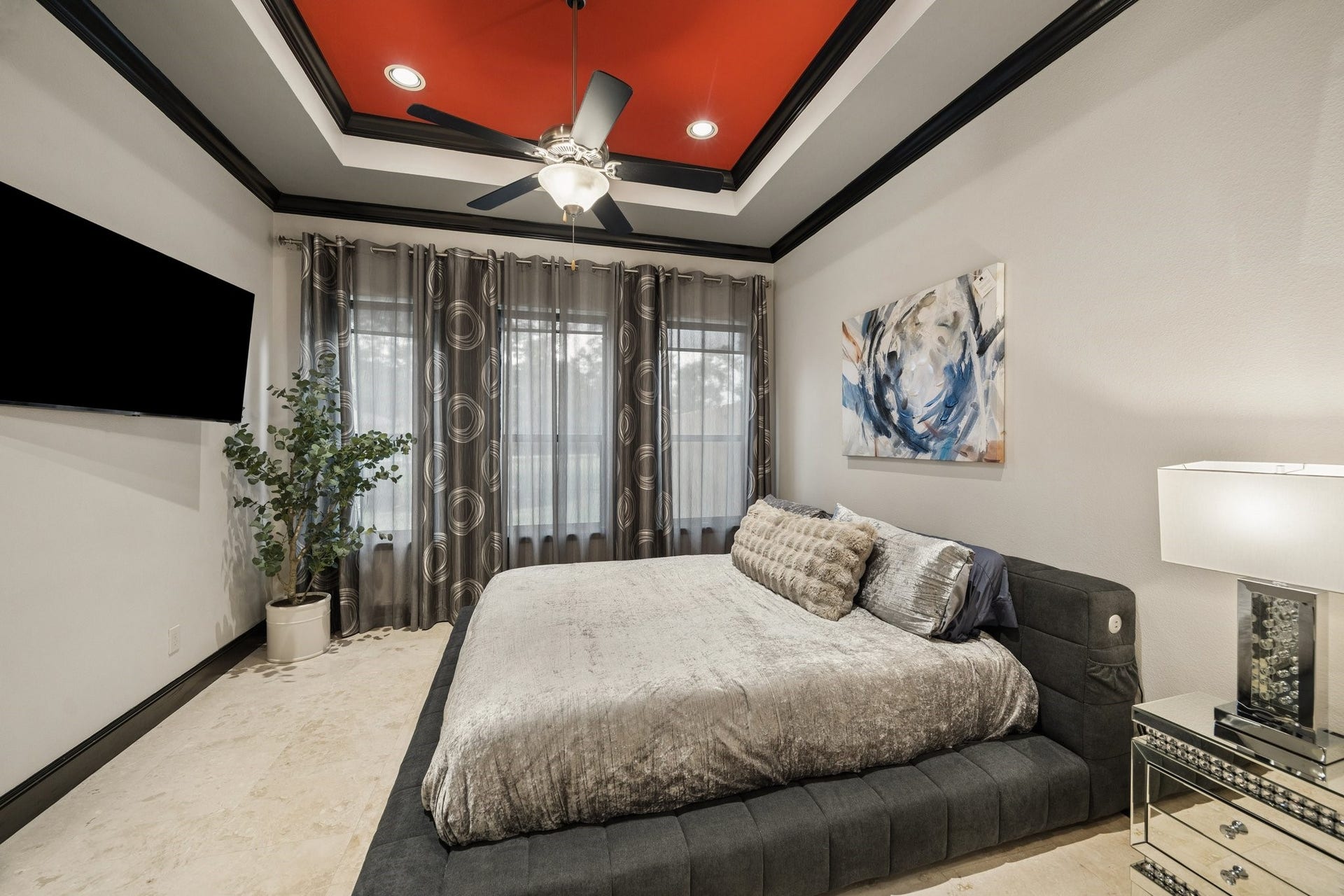 27303 E Benders Landing Boulevard, Spring, TX 77386 Third bedroom features its own private ensuite bathroom, tray ceiling with accent details, ceiling fan, creating a warm and inviting retreat.