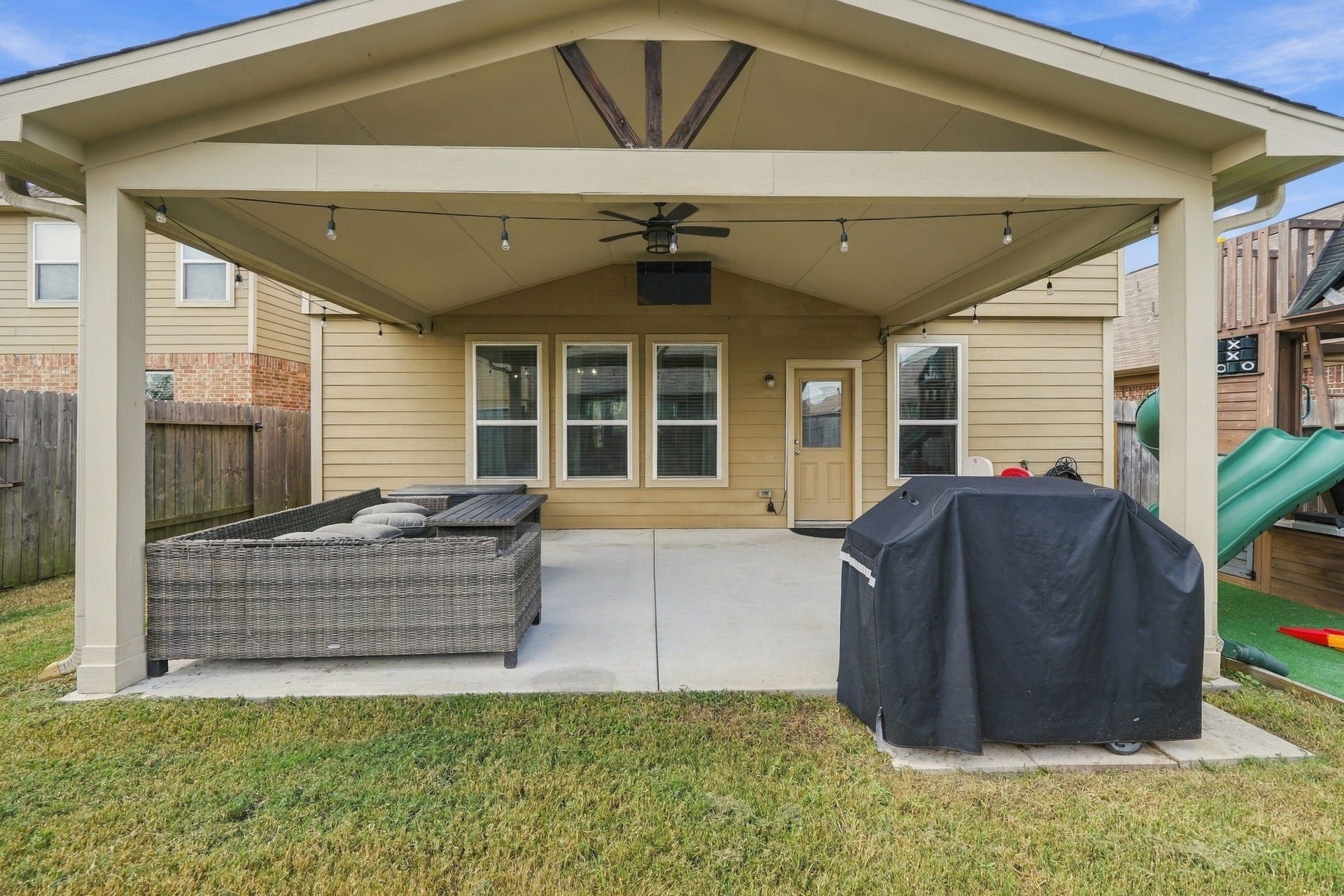 Covered Patio: Expansive covered patio creates a true extension of the living space with plenty of room for outdoor seating, dining and entertaining.