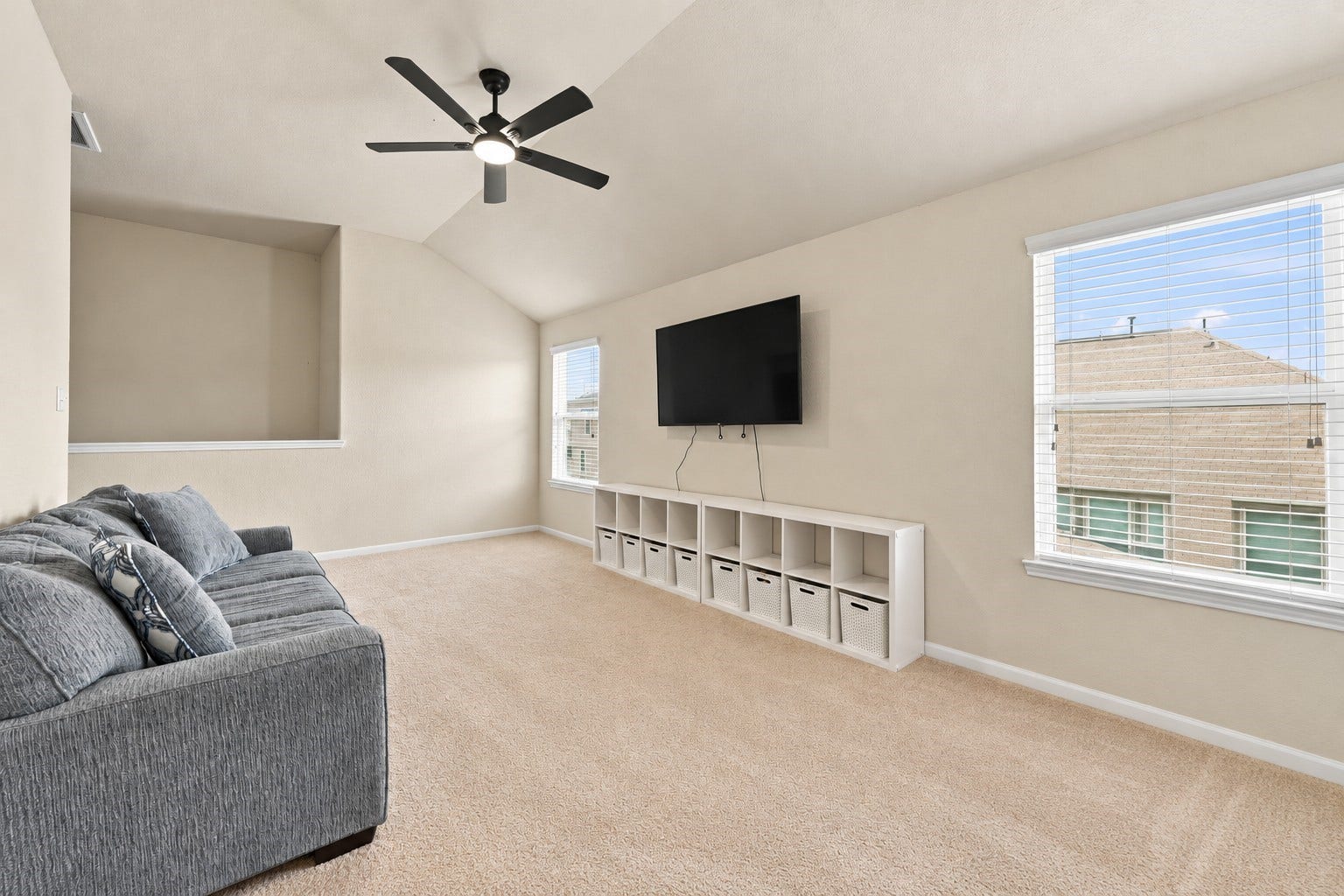 Game Room: Expansive upstairs game room with tall ceiling offers valuable additional living space for entertainment, media or flexible everyday use.