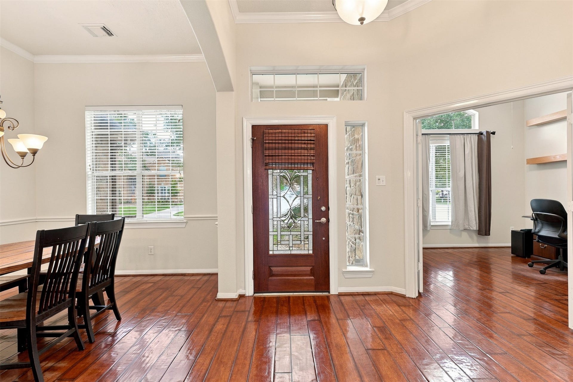 6522 Pine Reserve Drive, Spring, TX 77389 The inviting entryway is elegantly framed by a spacious dining room and a functional home office.