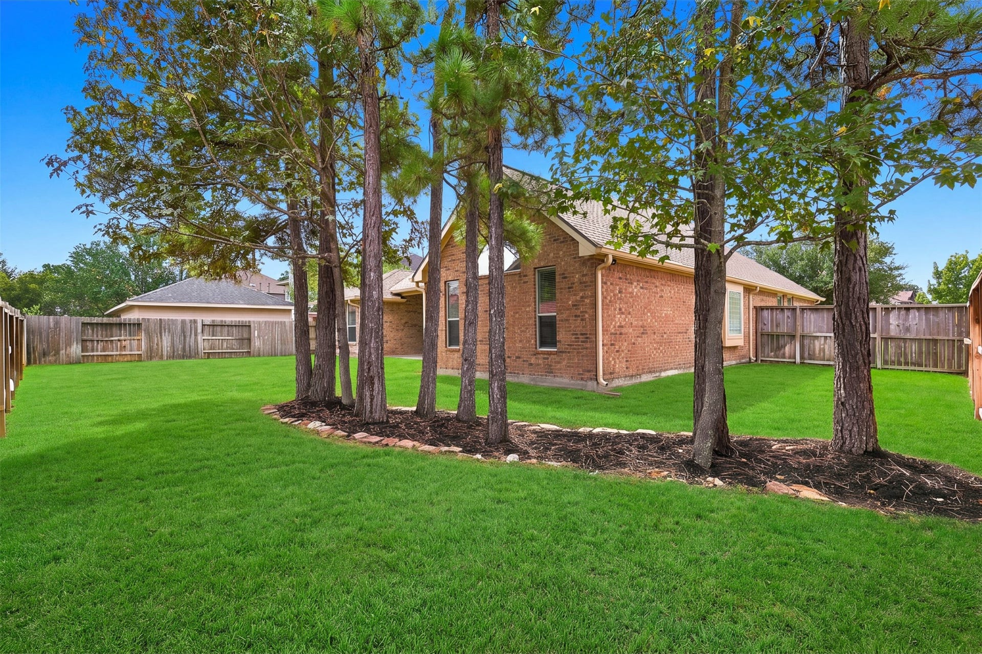 6522 Pine Reserve Drive, Spring, TX 77389 Check out this large back yard with trees only on one side.