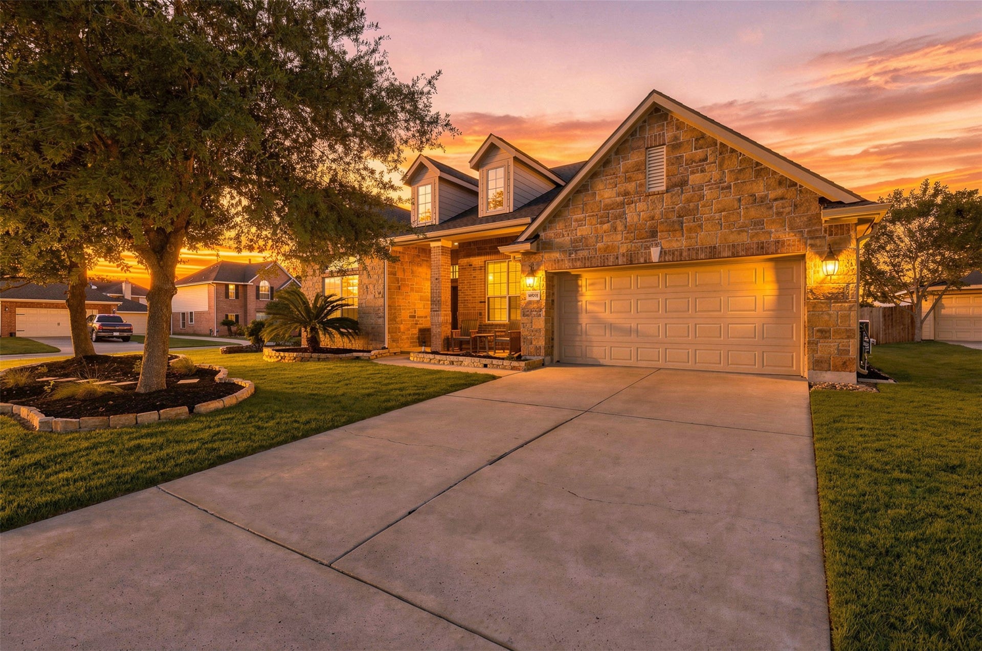 6522 Pine Reserve Drive, Spring, TX 77389 Charming stone and brick exterior enhances curb appeal.