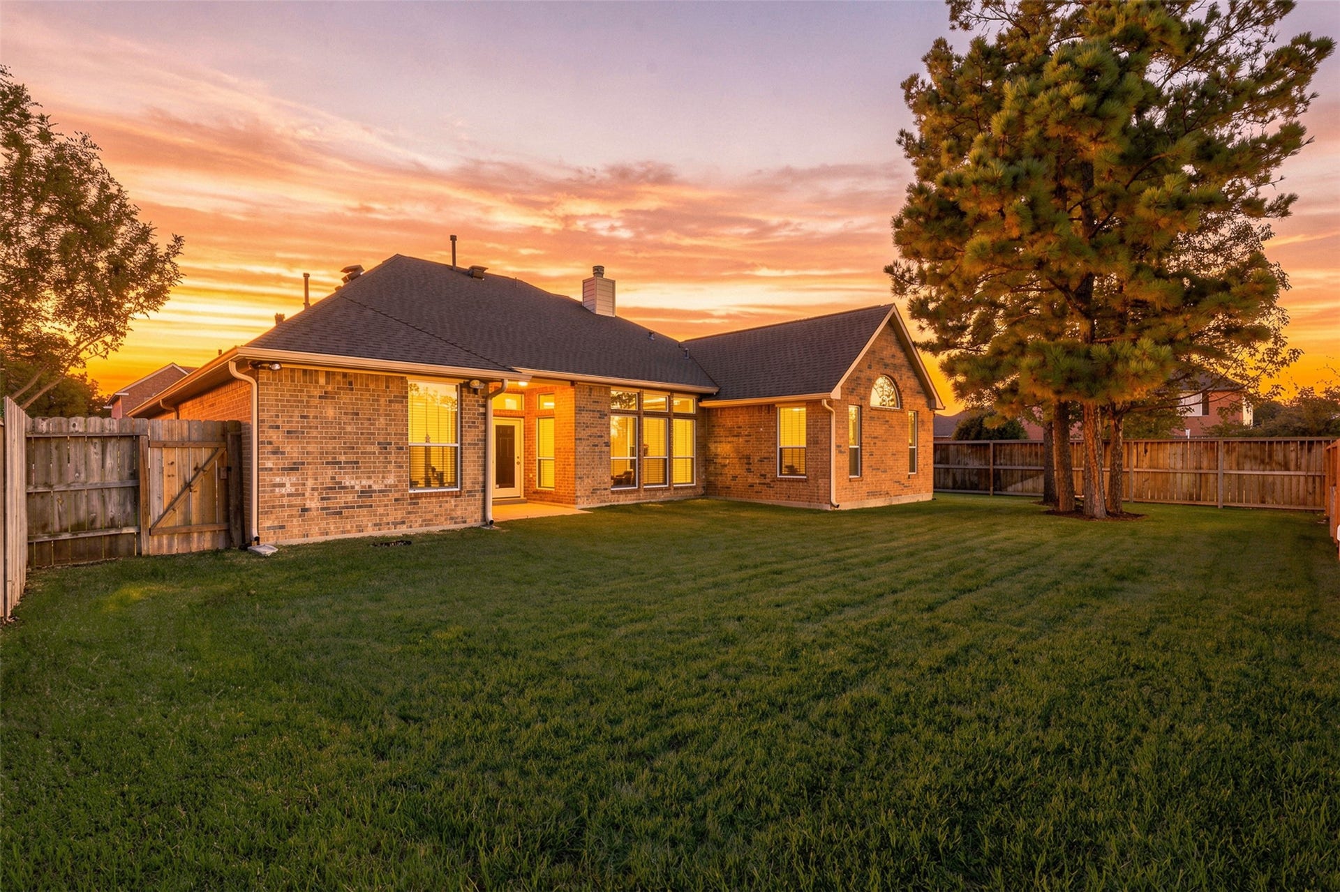 6522 Pine Reserve Drive, Spring, TX 77389 Elegant brickwork spans the entire back of the home, offering timeless charm and durability.